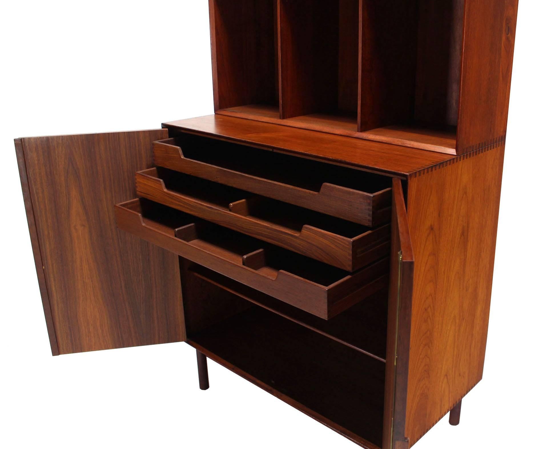 Magnificent solid teak design cabinet by Peter Hvidt.