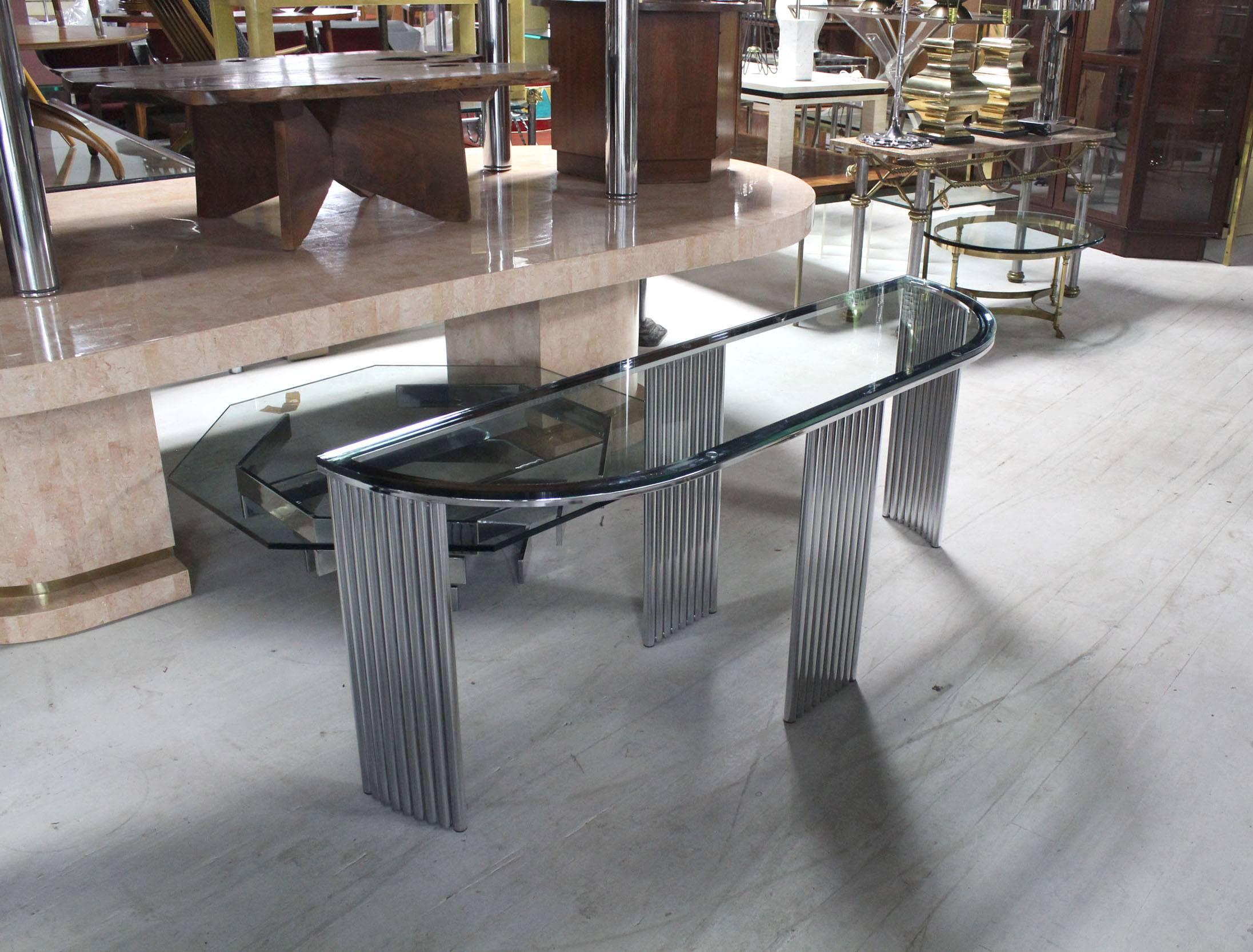 Mid-Century Modern chrome console table with thick glass top.