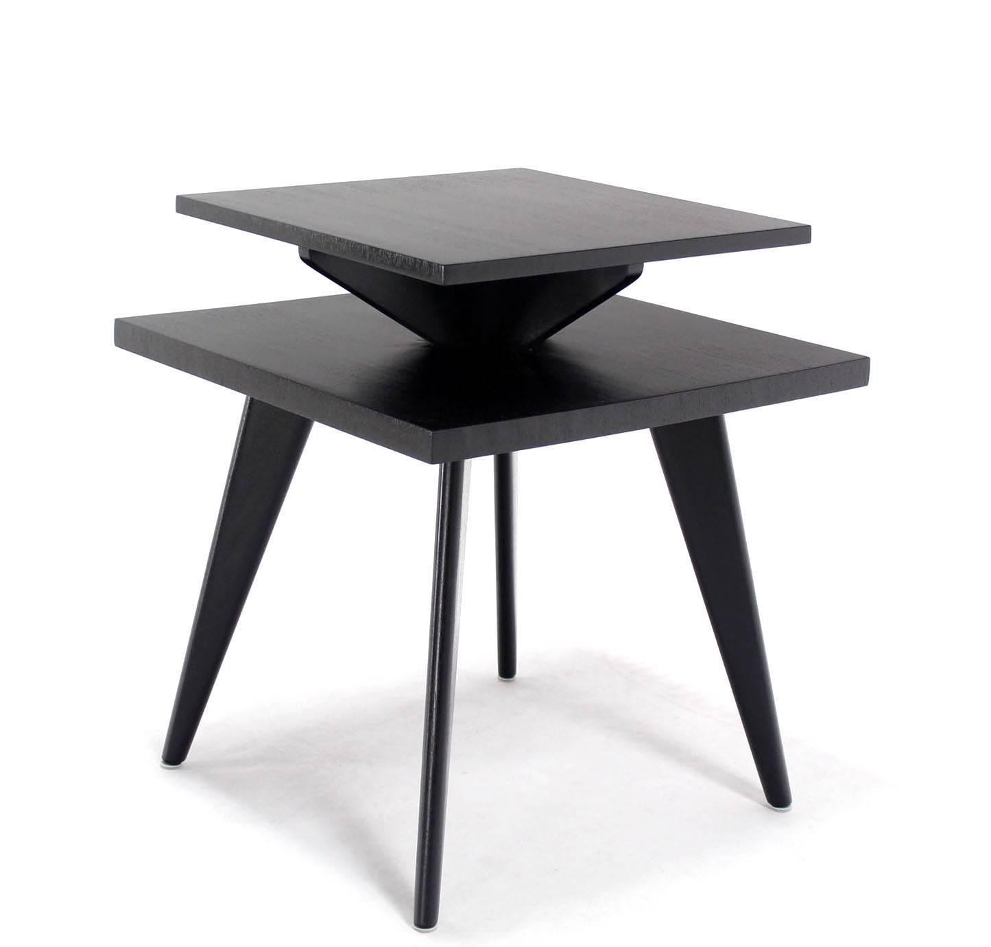 Nice Mid-Century Modern black lacquer side table. Heavy and solid design construction.