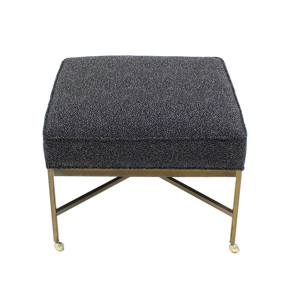 Nice Mid-Century Modern large solid brass ottoman with new upholstery in style of Paul McCobb.