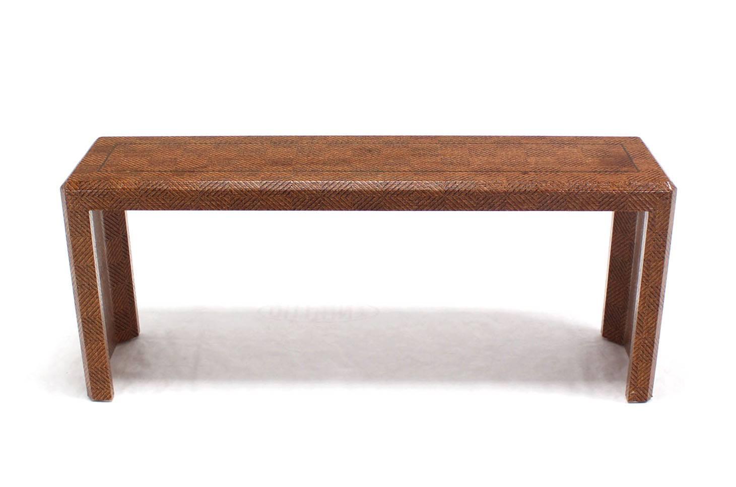 Nice quality Mid-Century Modern grass cloth covered table with brass inlay.
