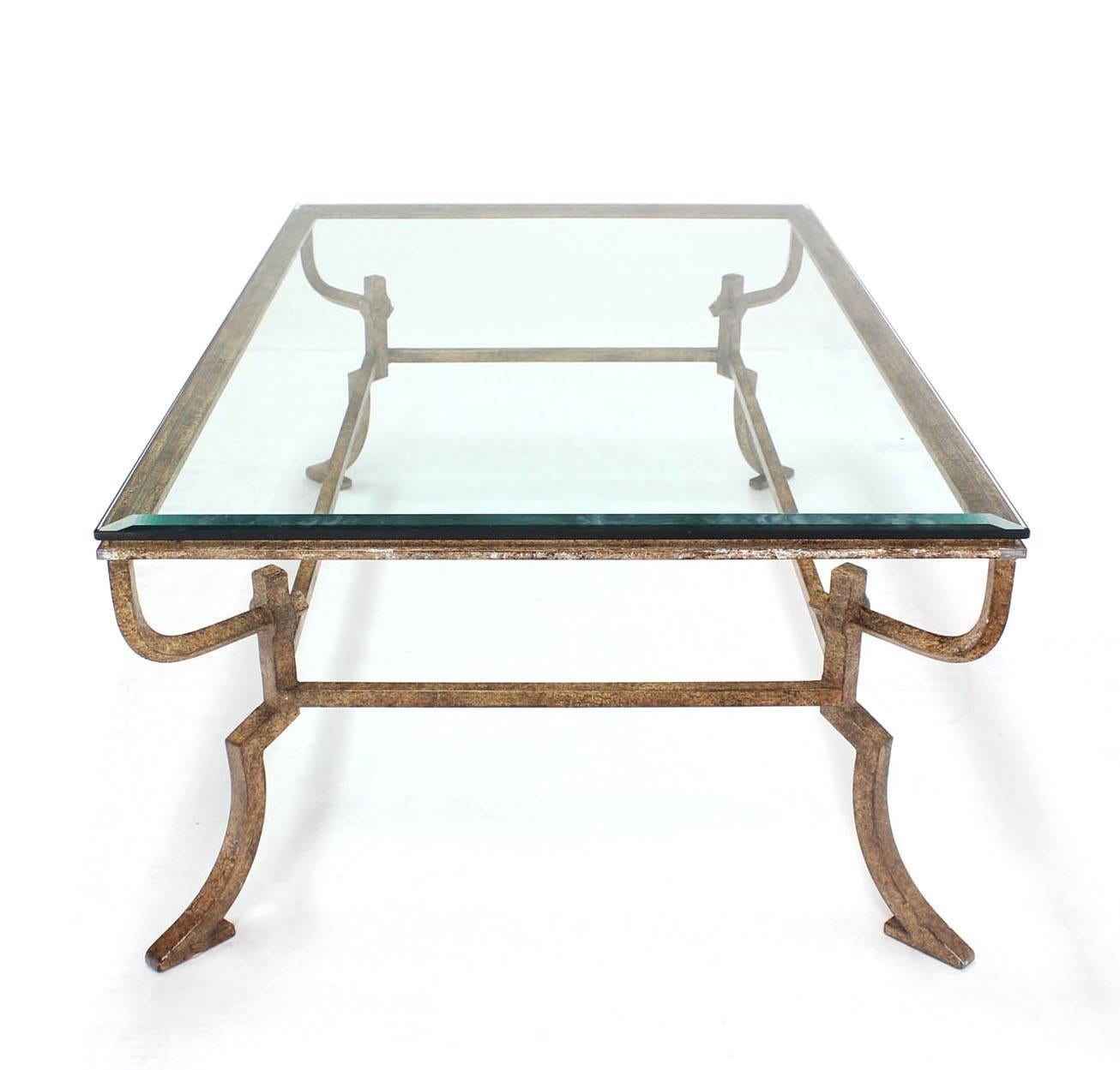 oval wrought iron coffee table with glass top