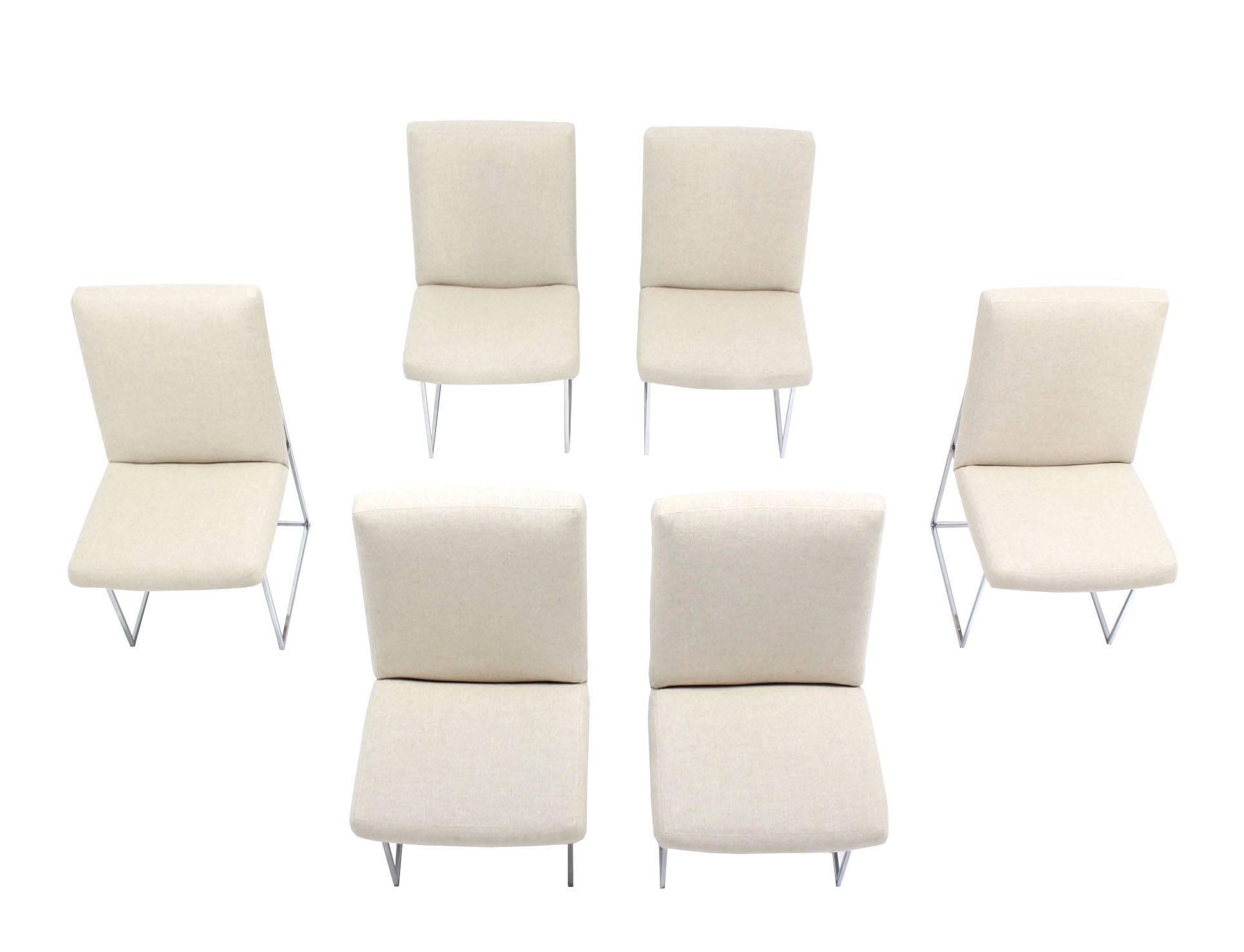 Set of 6 newly upholstered Milo Baughman dining chairs.