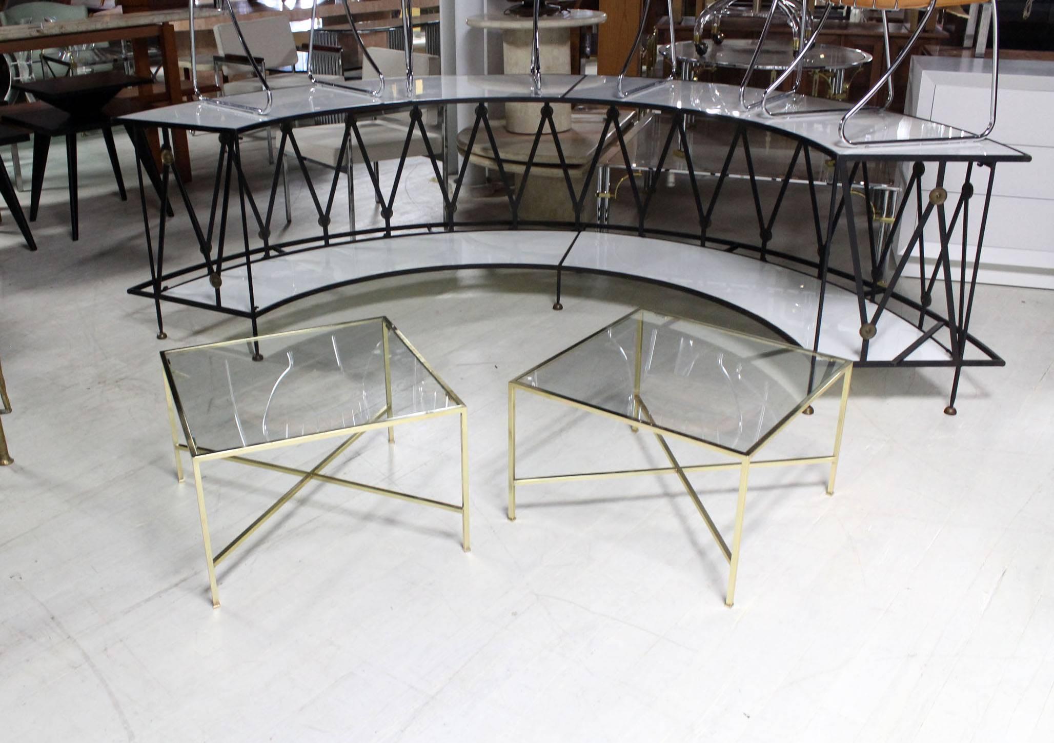 Pair of very fine solid brass X base side or end tables. 