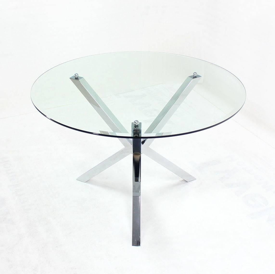 Mid Century modern chrome "Jacks" shape base glass top dining table.