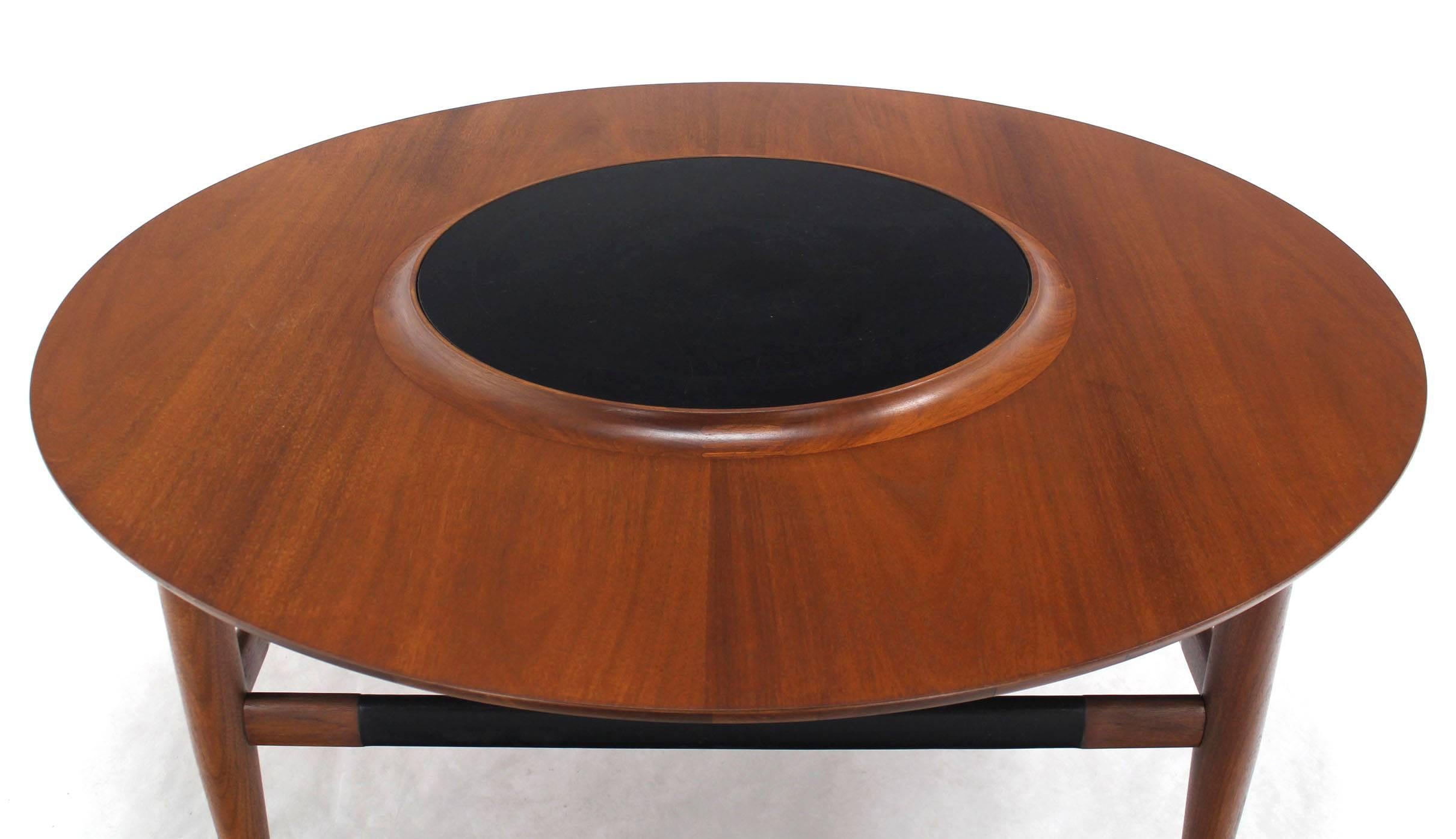 American Round Walnut Coffee Table with Raised Black Laminate Lazy Susan Center  For Sale