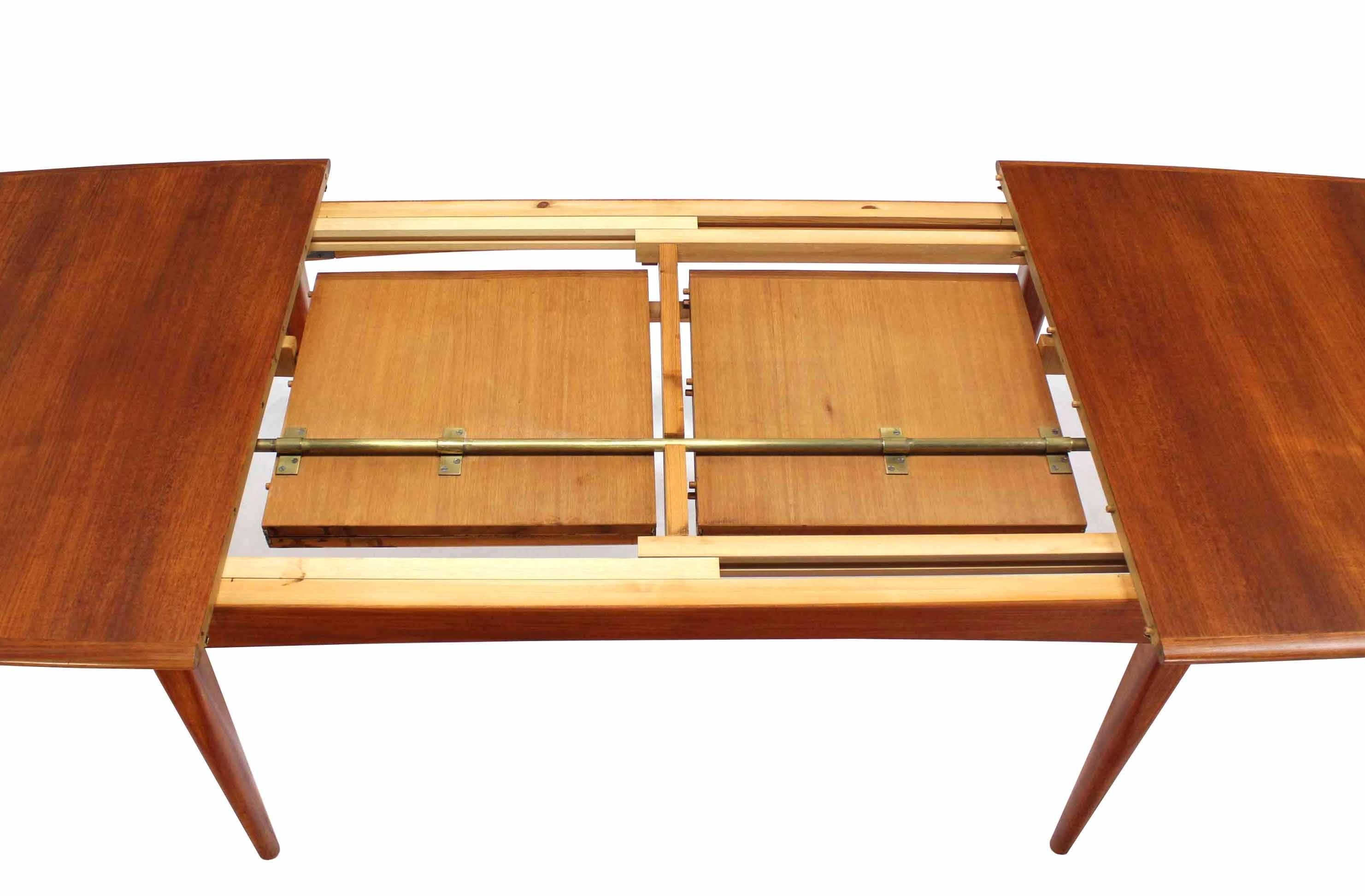Very nice Danish mid century modern dining table w/ 2x21" long "pop up" self storing leaves.