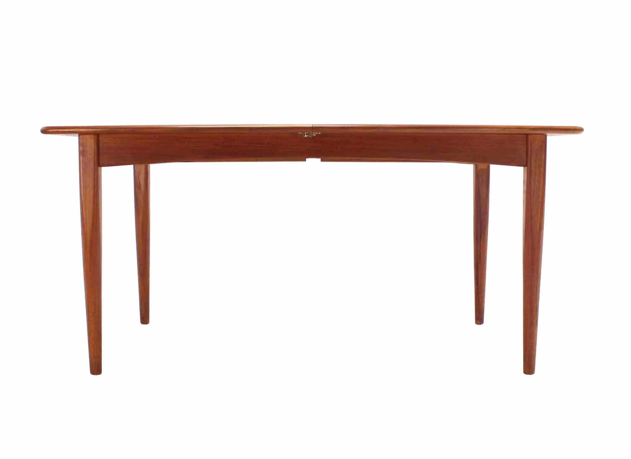 American Danish Modern Teak Boat Shape Dining Table with Two Pop-Up Leafs Extension Board For Sale