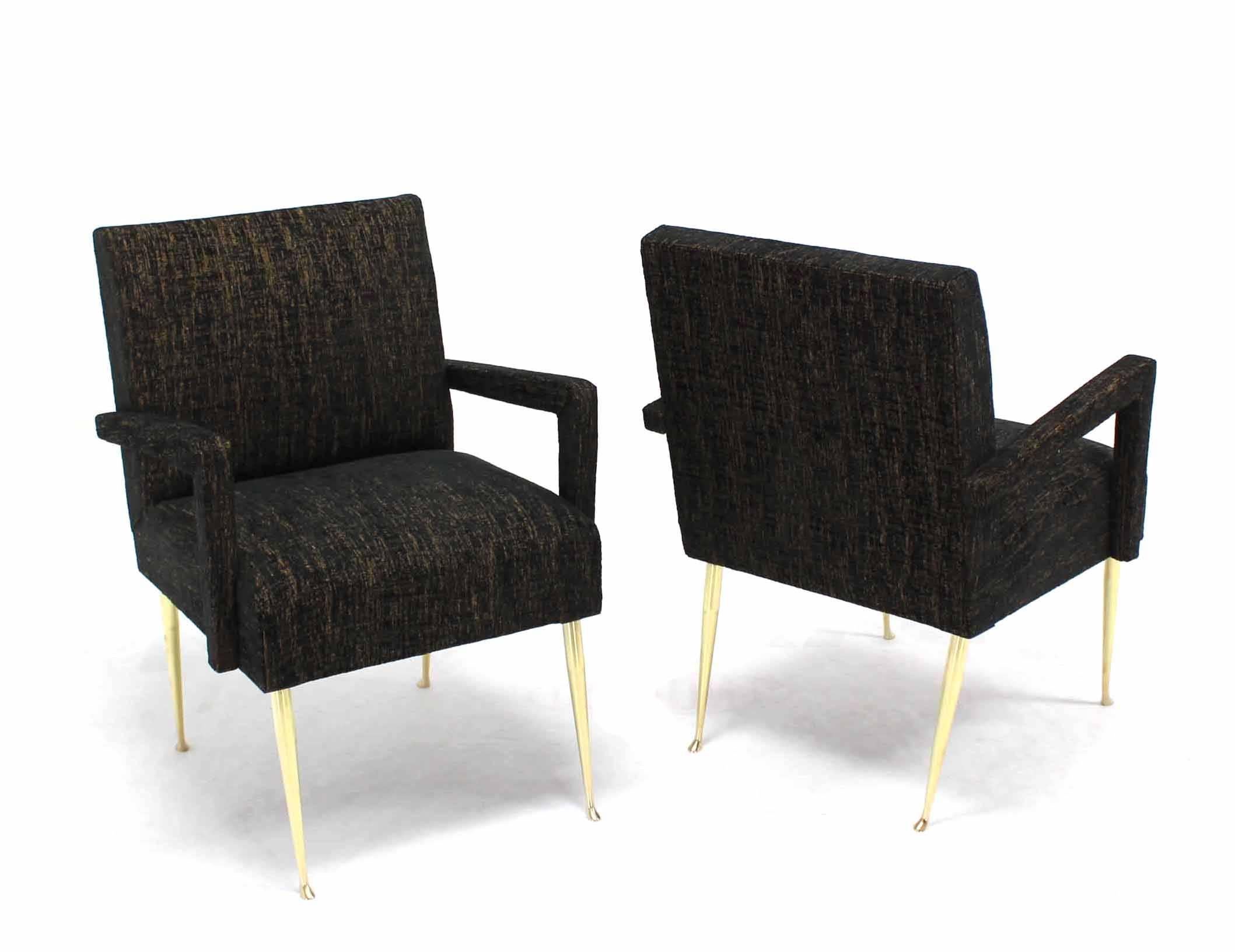 Pair of very nice Italian Mid-Century Modern lounge chairs on solid brass legs. New two-tone black and gold upholstery.