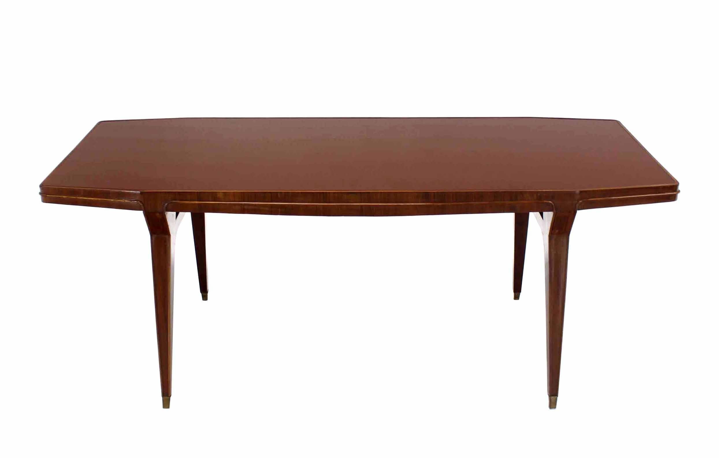 High quality Italian mid century modern boat shape dining room table in style of Gio Ponti.