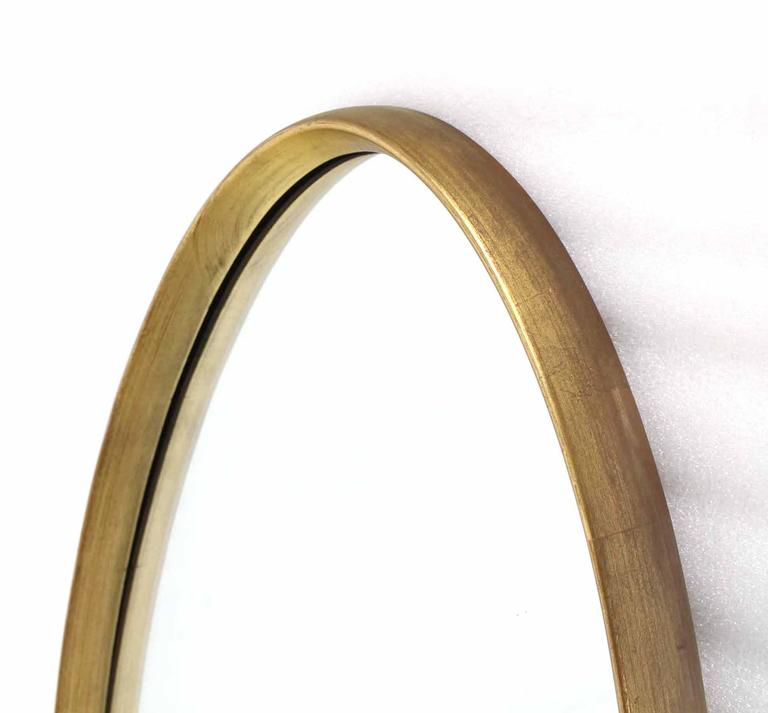Mid Century Modern Gold Giltwood Oval Mirror For Sale at 1stDibs