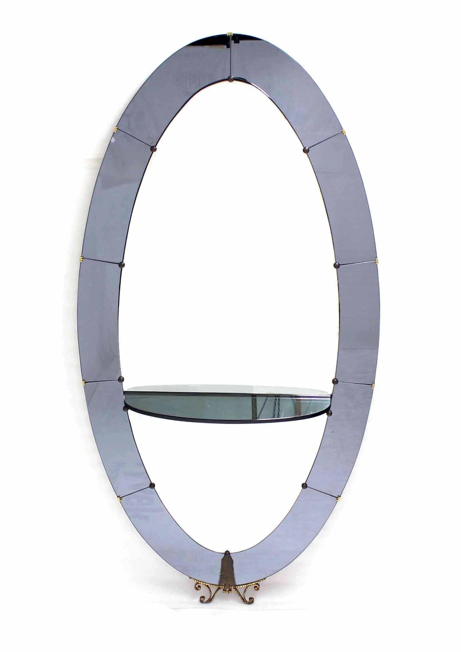 Outstanding two tone cobalt blue and clear oval Art Deco cheval floor mirror with glass shelf perfect vanity alternative. This is a very good quality unique piece. This is a very large and heavy mirror with thick glass shelf. Measures: 7 foot tall.