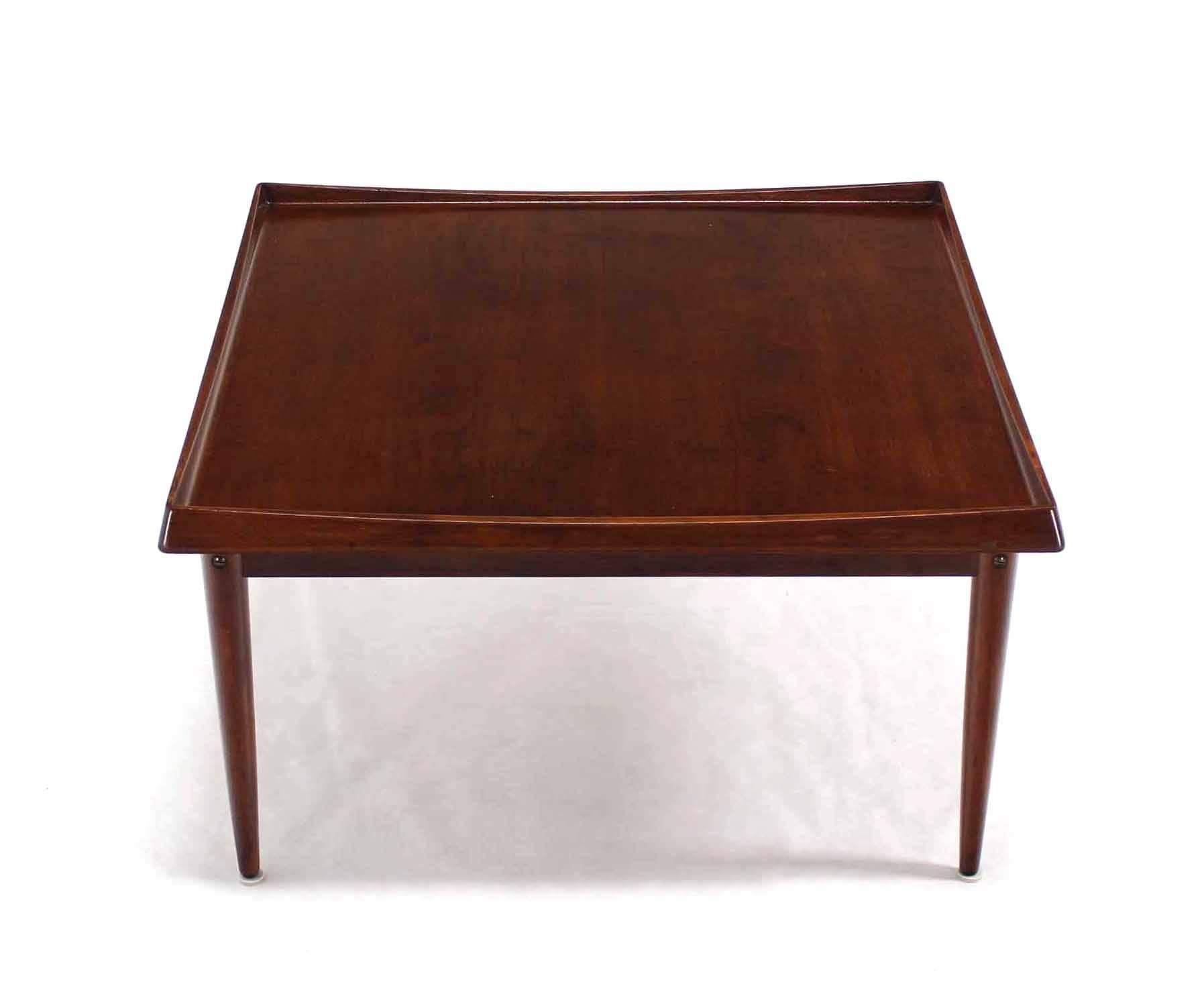 Nice Danish modern square teak coffee table with nice solid teak rolled edge. Made in Norway.
