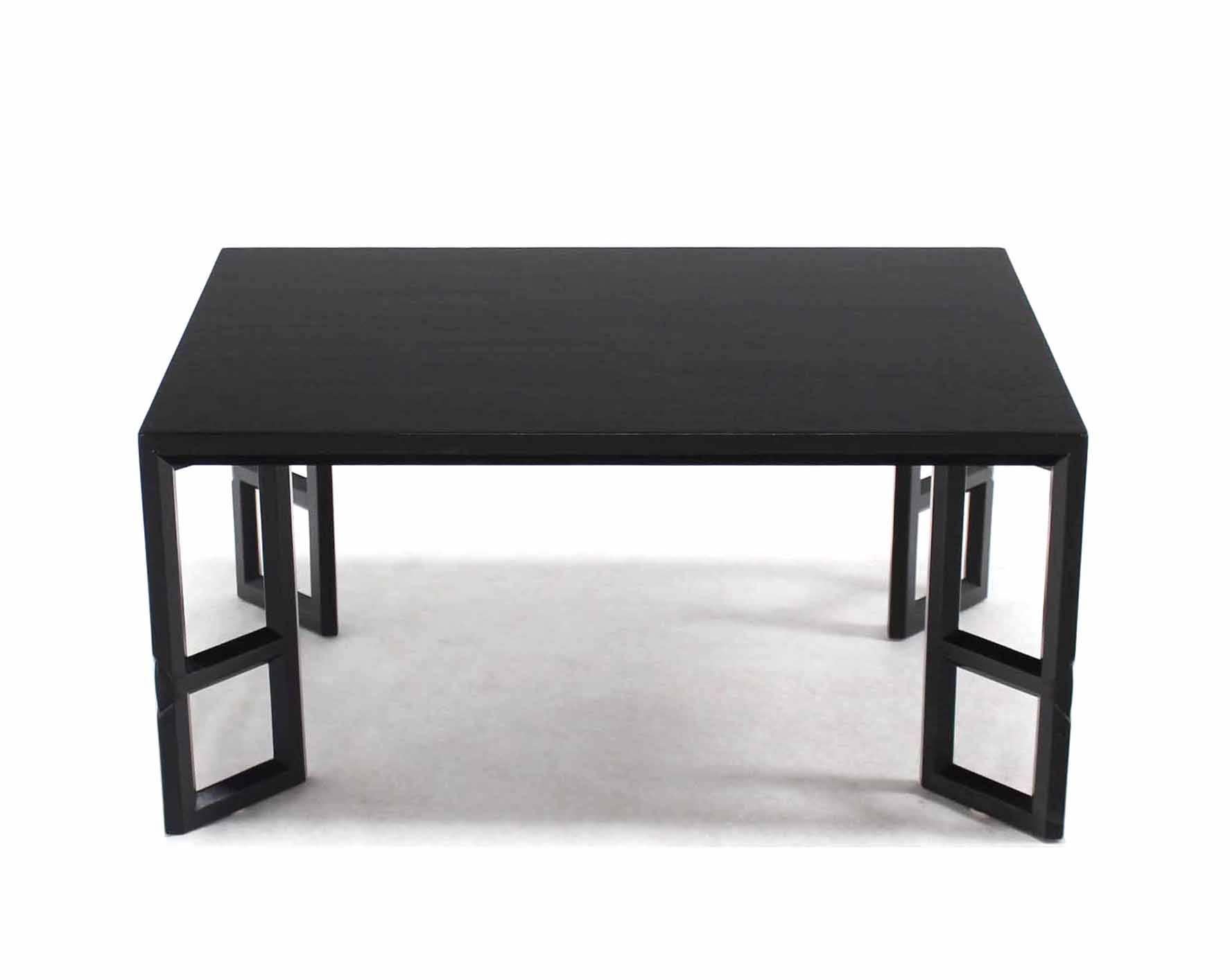 Very nice craftsmanship Mid-Century Modern "frame" leg black lacquer coffee table. The frame leg has small Art Nouveau style carving. 