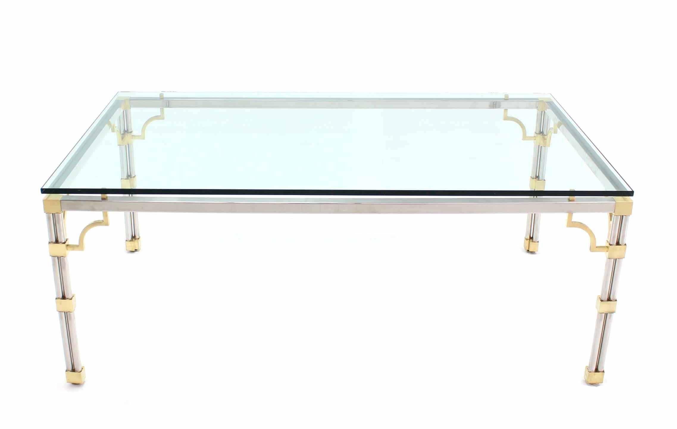 Rectangular Mid-Century Modern 3/4 inch glass top dining or conference table.