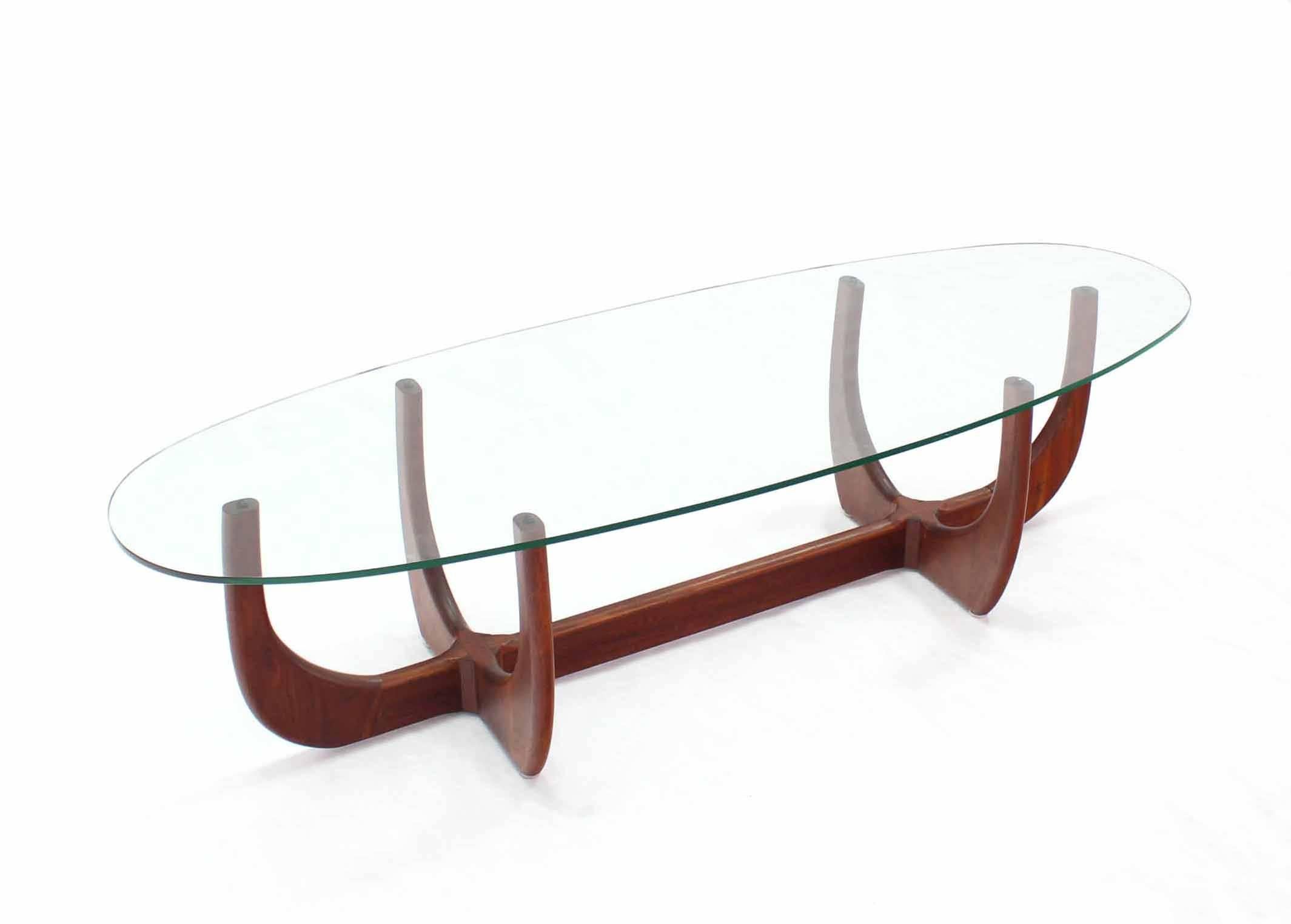 Midcentury Oval Glass Top Sculptured Walnut Base Coffee Table In Excellent Condition In Rockaway, NJ