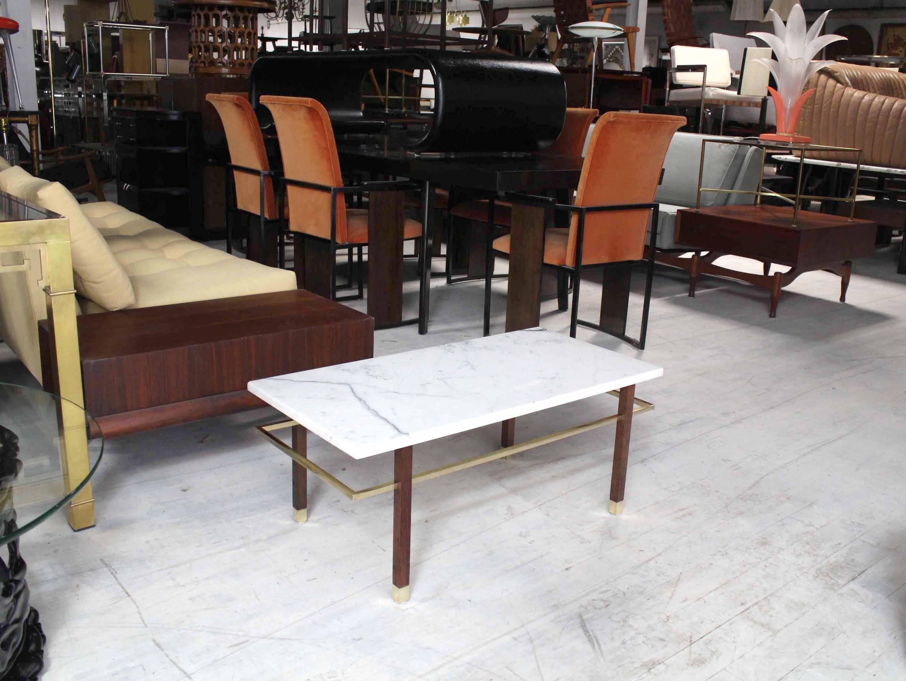 Very nice Mid-Century Modern rectangular coffee table by Harvey Probber. Nice around perimeter solid brass stretcher.