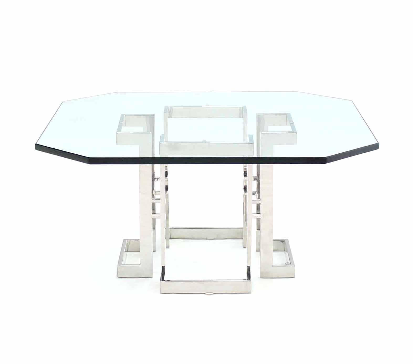 Mid Century Modern square chrome base with close to occasional shape glass top coffee table in style of M. Baughman.