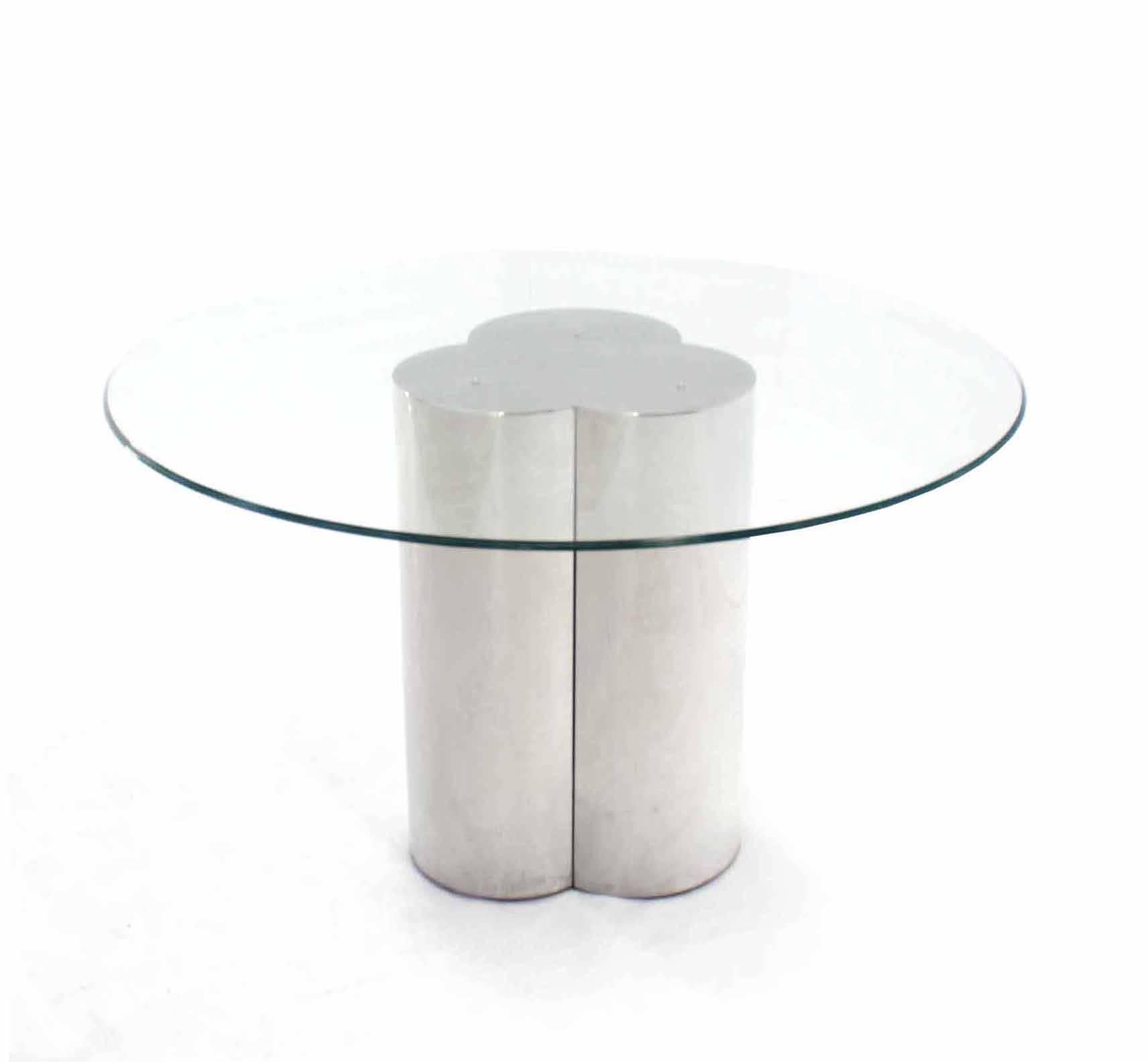 Nice figural chrome or stainless steel base round dining table.