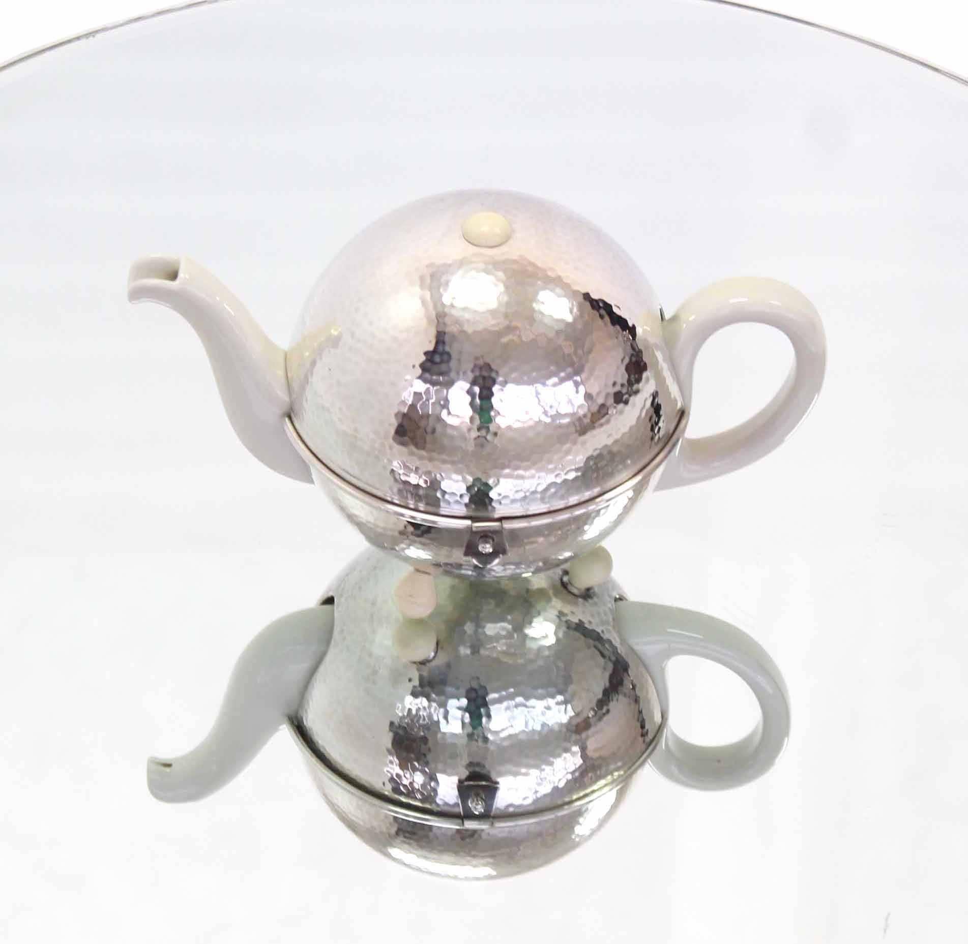 WMF Porcelain Tea Pot in Hammered Metal Insulated Cover In Excellent Condition In Rockaway, NJ