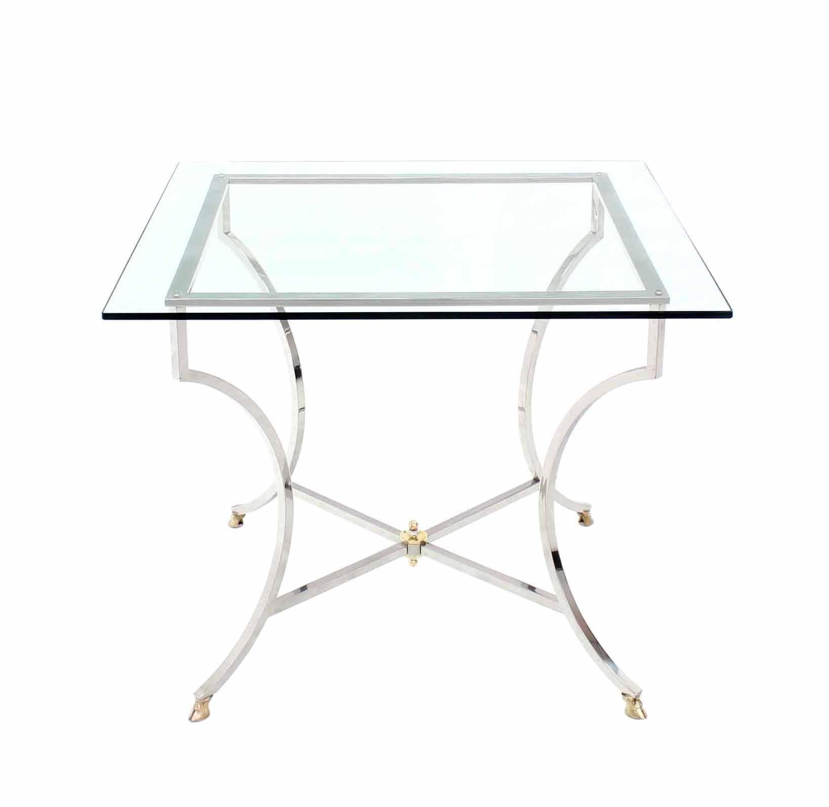 Brass hoof feet stainless steel base thick glass top game table.