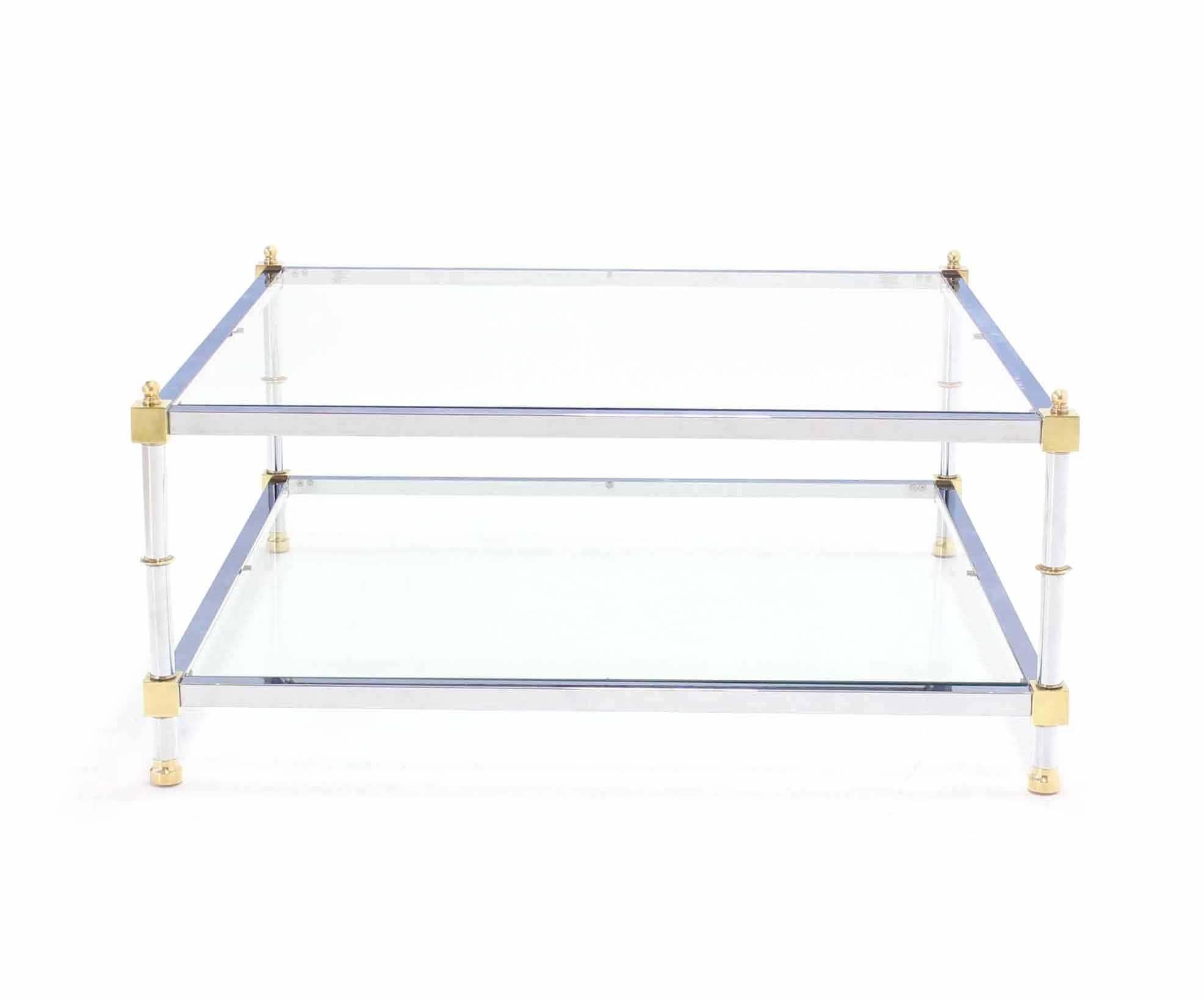 Glass polished chrome and brass Mid-Century Modern square two-tier coffee table. Measures: 37 x 37.