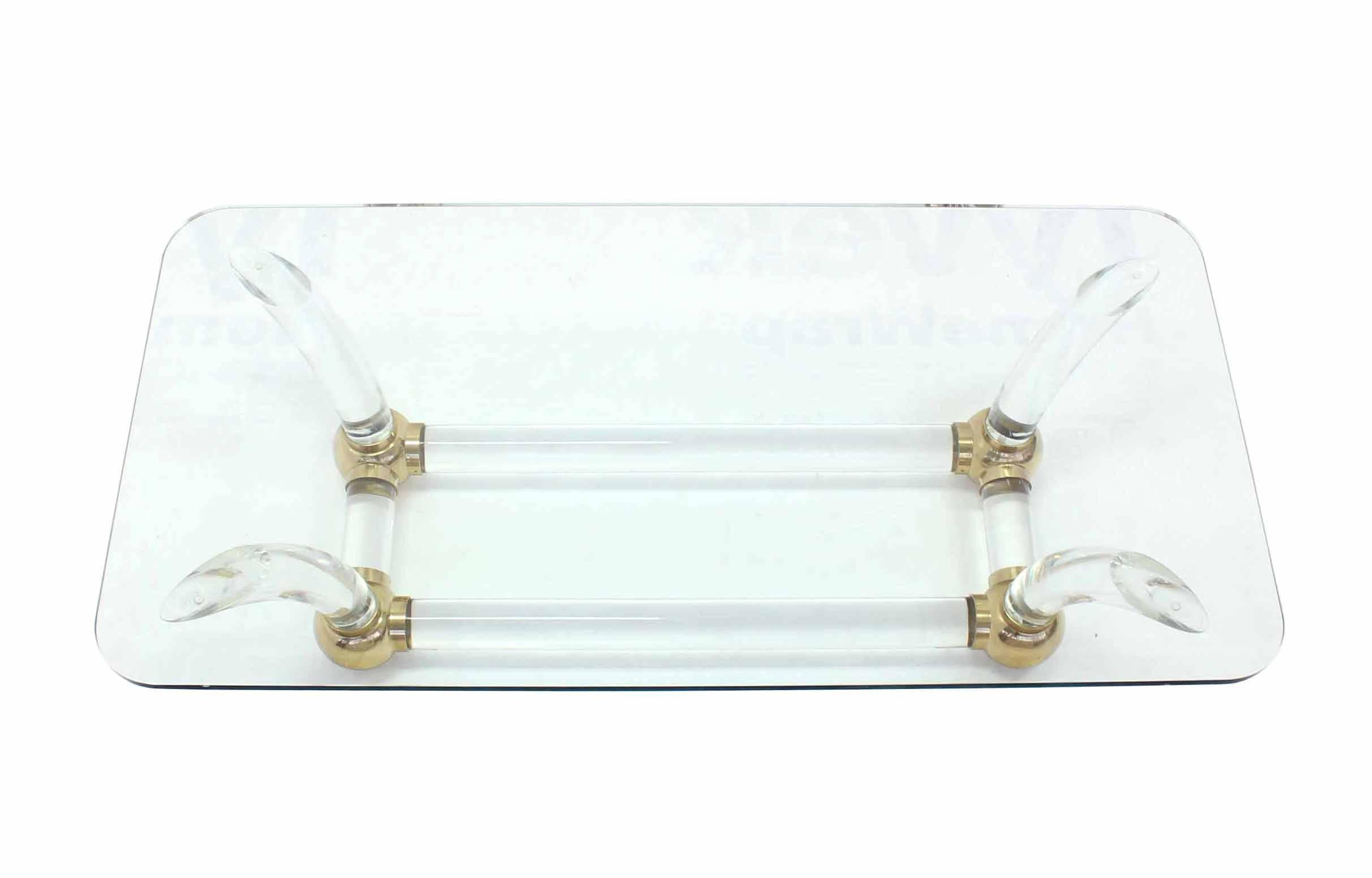 Mid-Century Modern Heavy Thick Lucite and Brass Base Thick Glass Top Coffee Table For Sale
