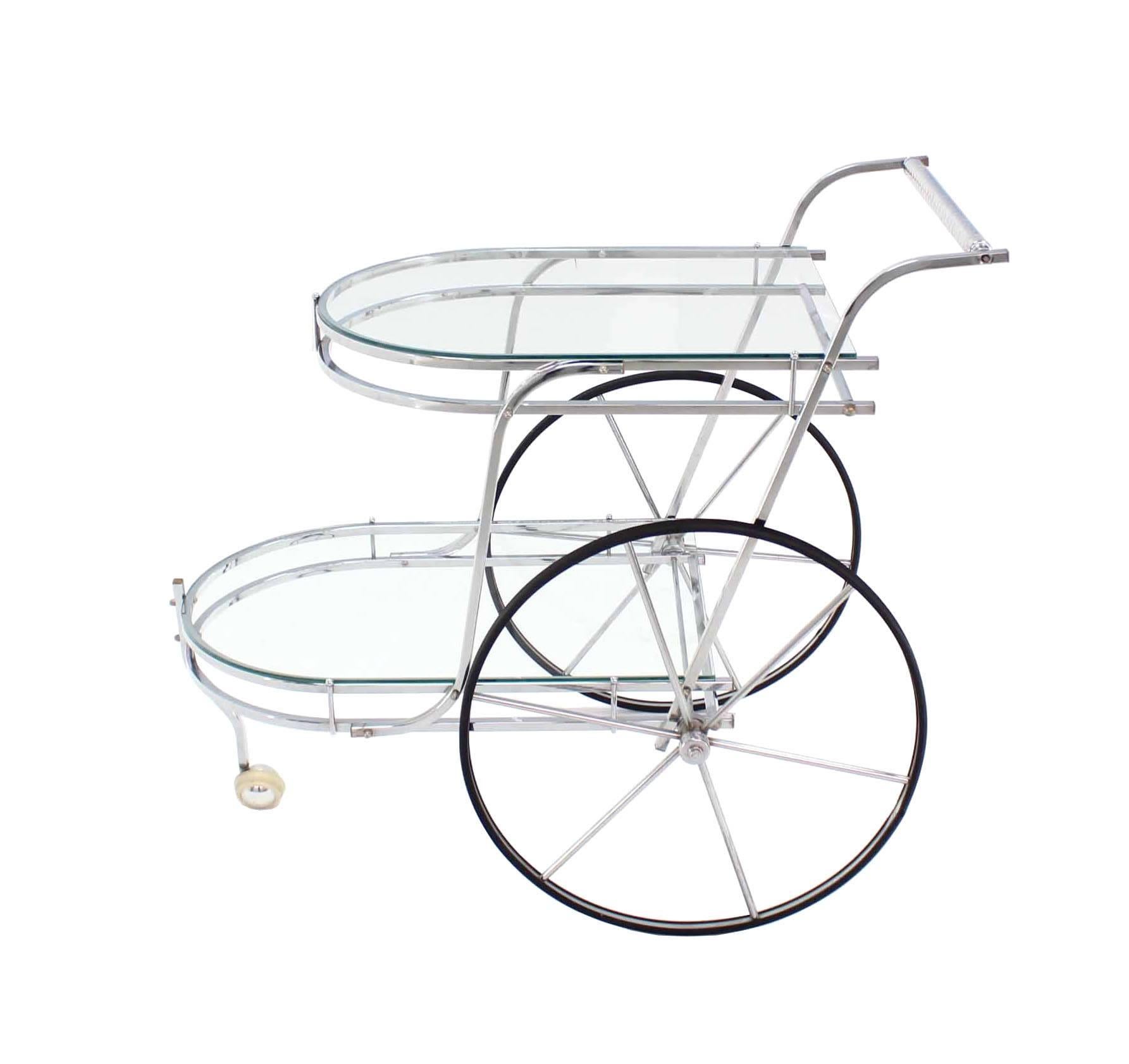 Nice Mid-Century Modern polished chrome and glass rolling bar tea cart.