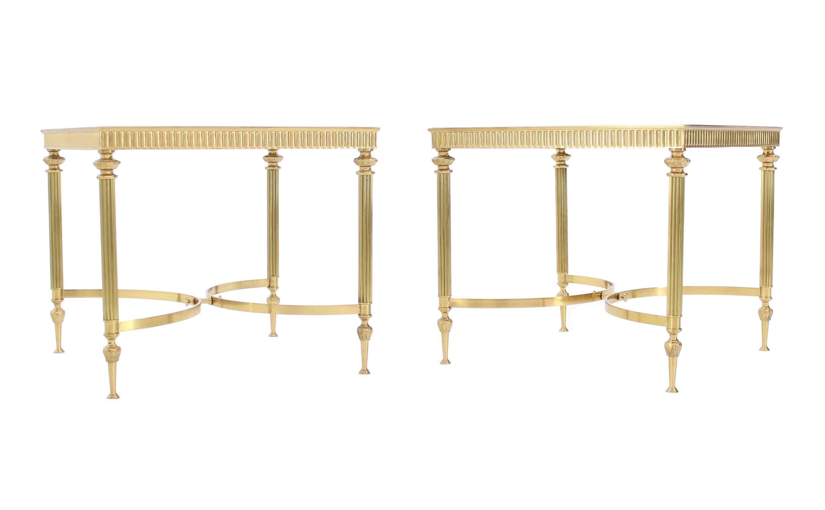 Pair of square polished brass side tables stands with mirrored glass tops. The matching coffee is listed separately.