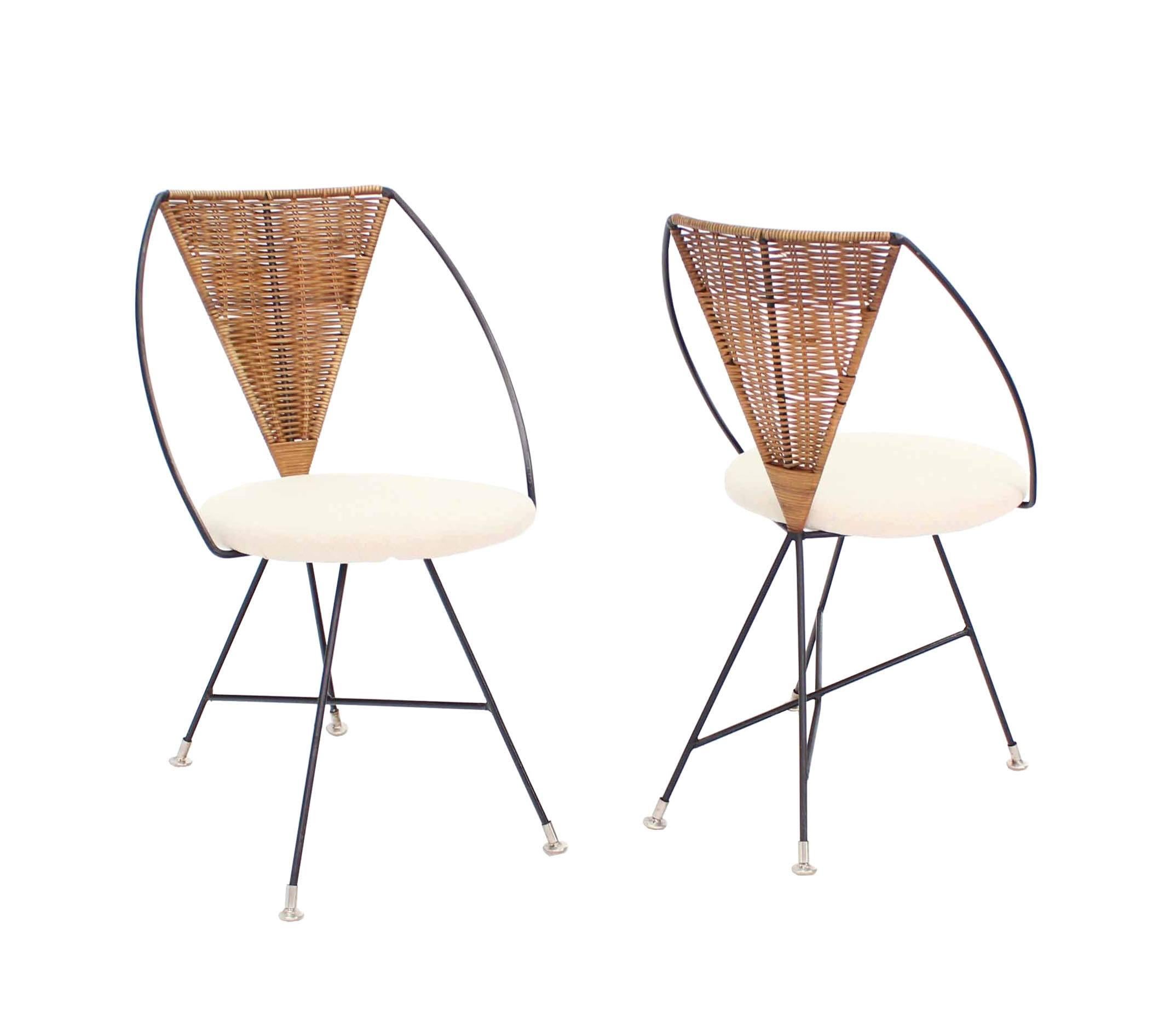 New upholstery whicker backs Mid-Century Modern side dining chairs. Outdoor optional. Nice bent wire design.