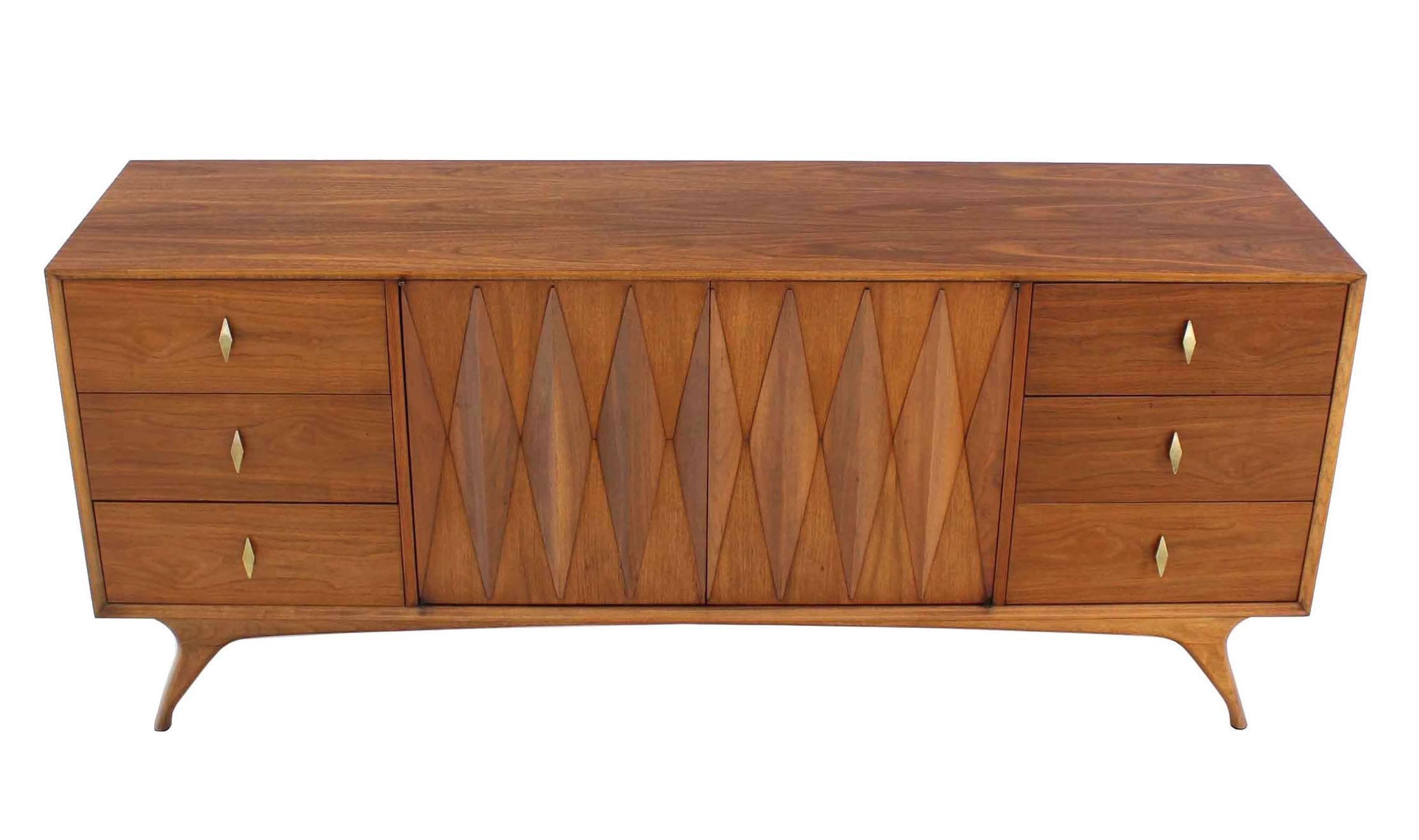 Nice Mid-Century Modern walnut credenza with diamond pattern from doors.