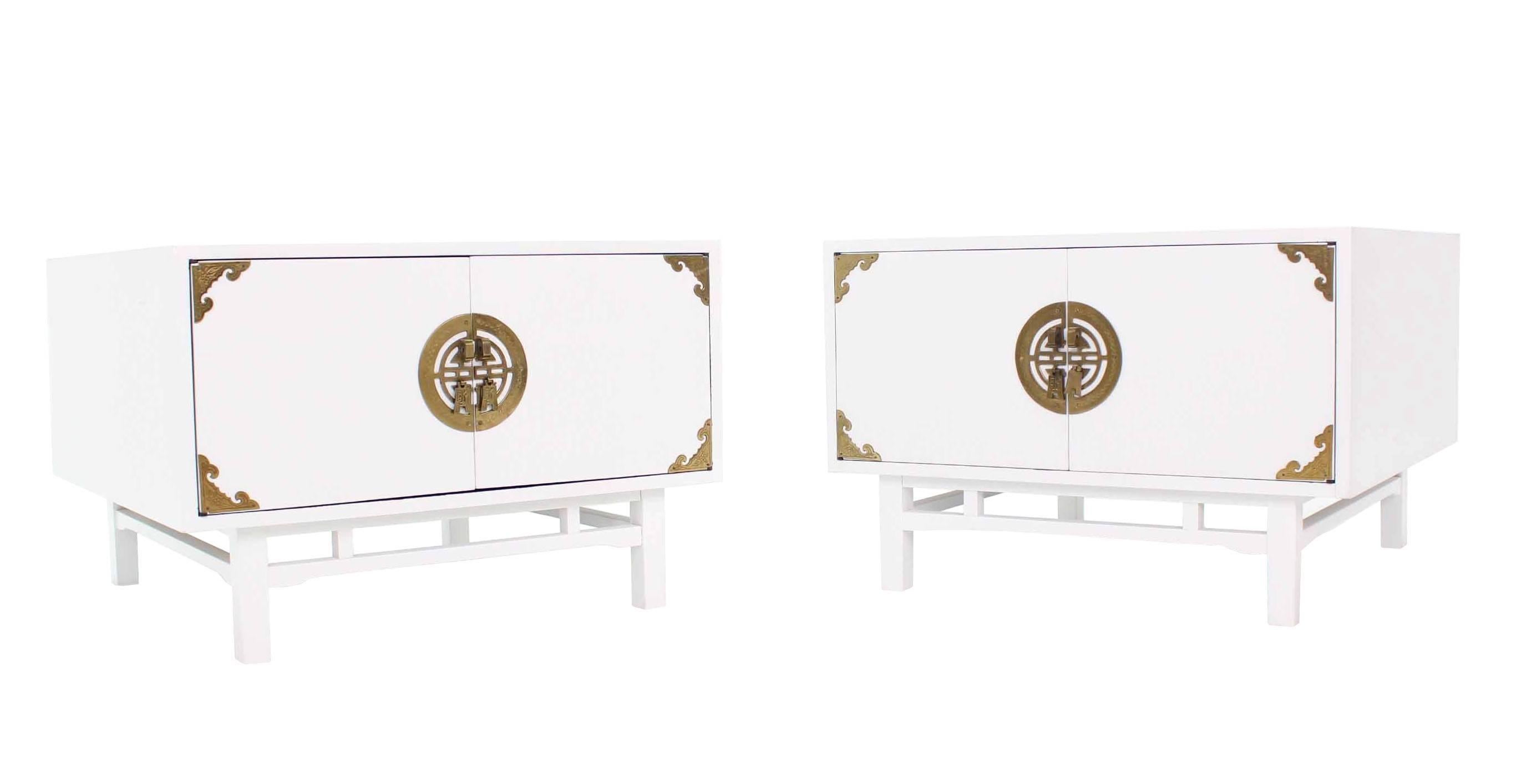 White lacquer brass hardware tables in style of James Mont. 