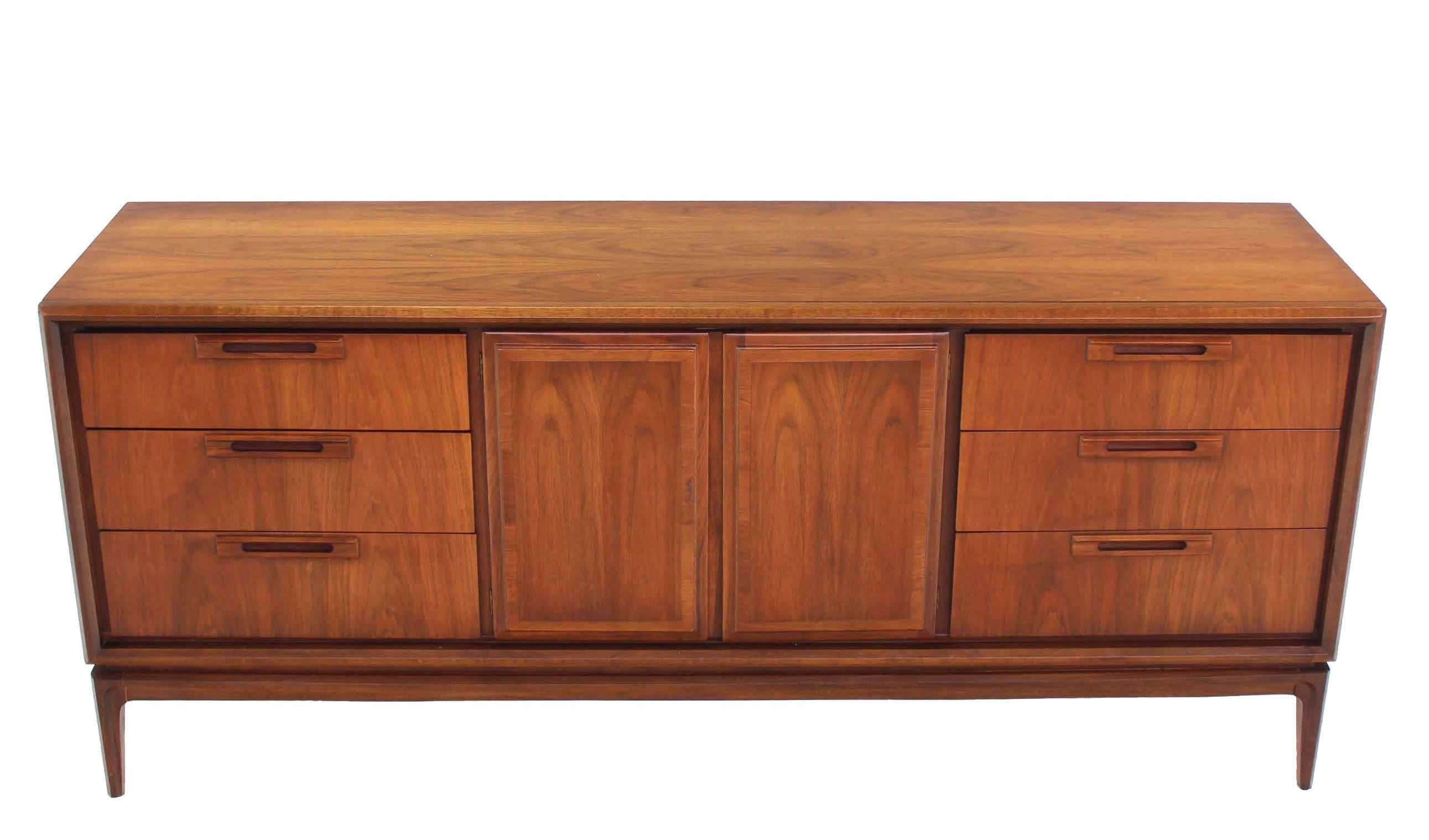 Nine drawer Mid Century Modern walnut credenza dresser.