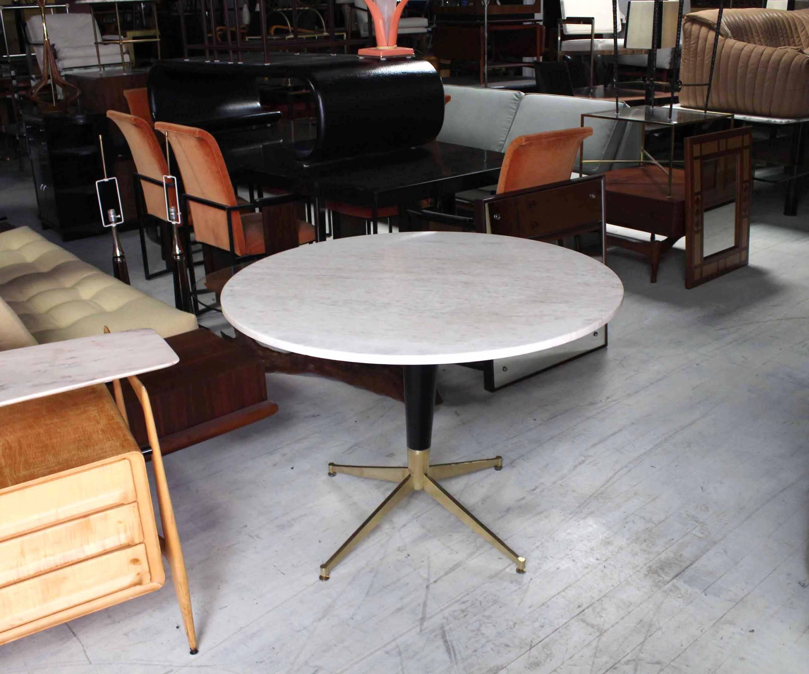 Solid brass cone shape base cafe dining dinette table with round marble top.