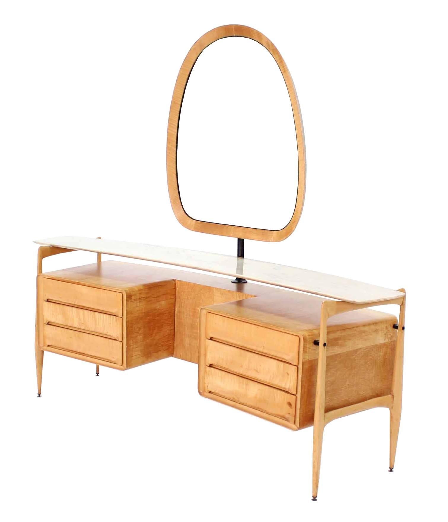 Beautiful curved shape Italian modern vanity with floating marble top.