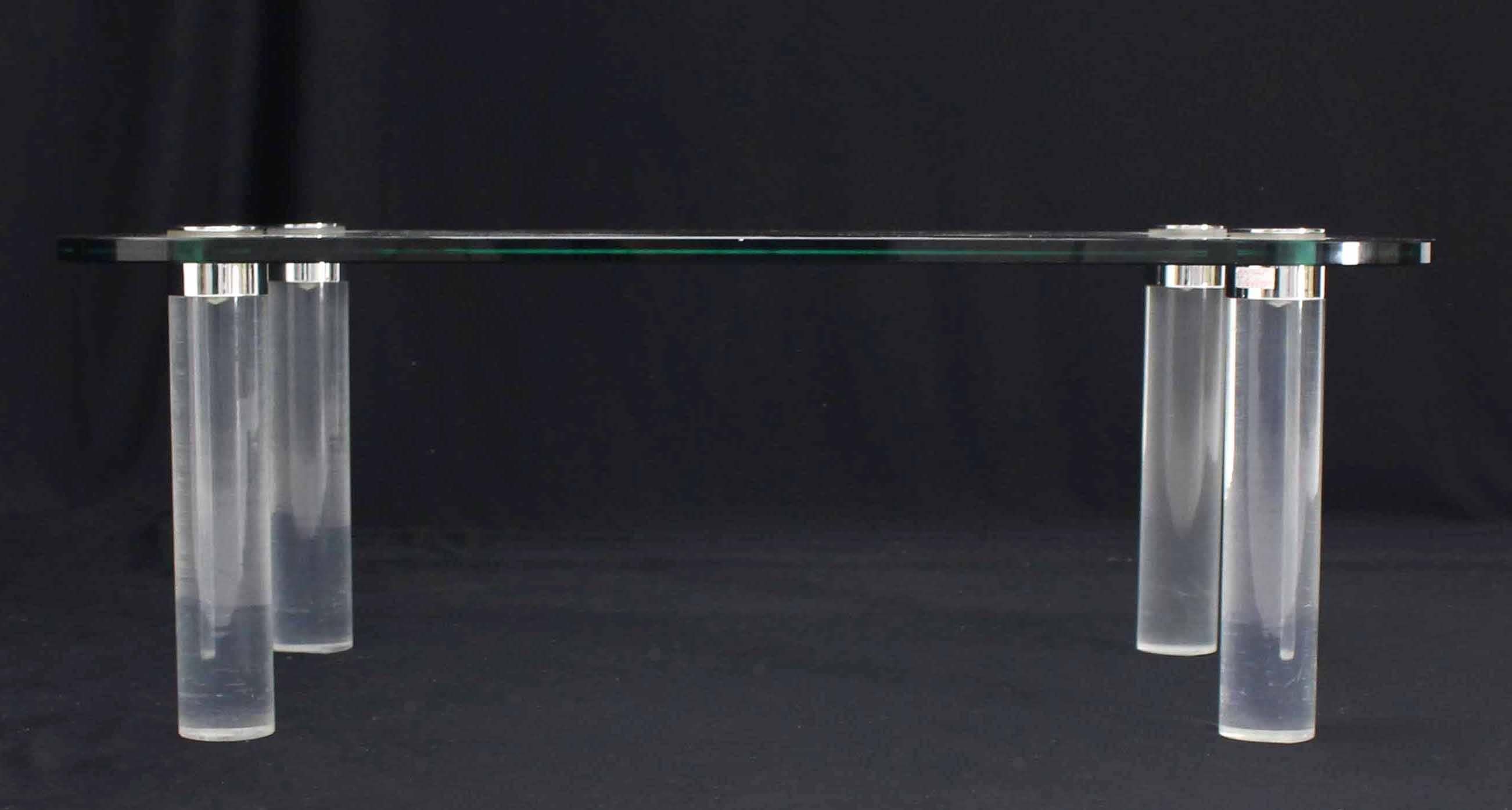 Rectangular Glass Top Lucite Cilinder Legs Coffee Table In Excellent Condition In Rockaway, NJ
