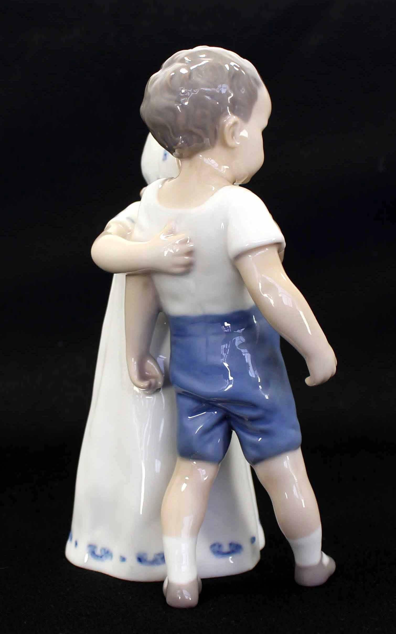 Girl Kissing Boy Royal Copenhagen Porcelain Figurine 1
