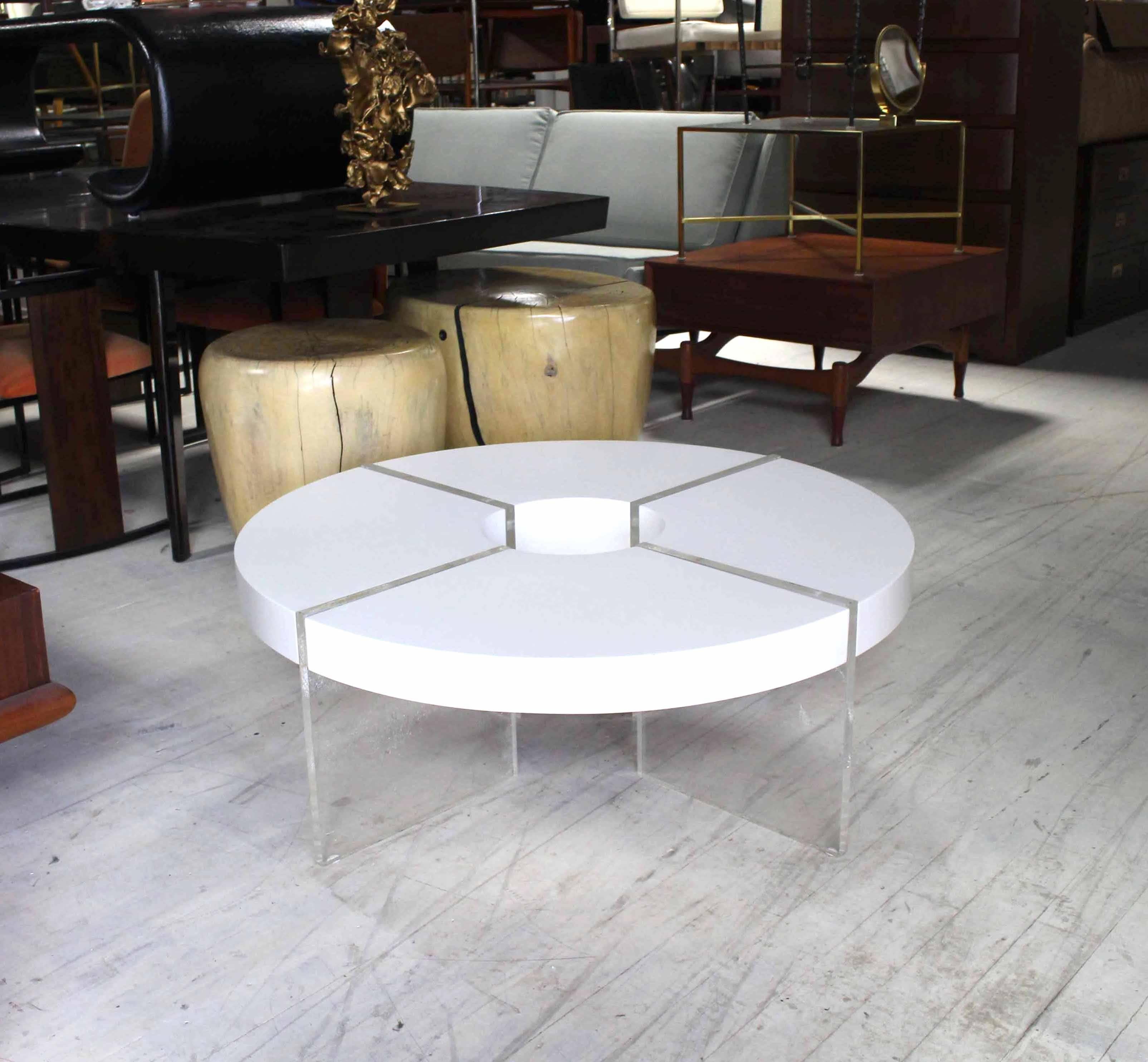 Very nice Mid-Century Modern Lucite base coffee table on Lucite legs with white lacquer top. Measures: 41" diameter.