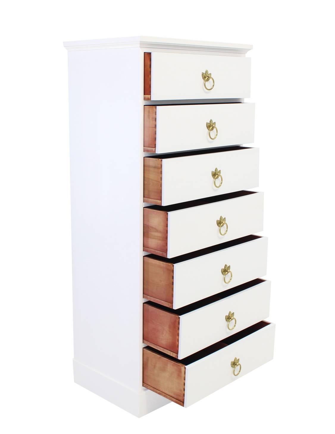 Mid-Century Modern white lacquer brass pulls tall seven drawer lingerie chest.