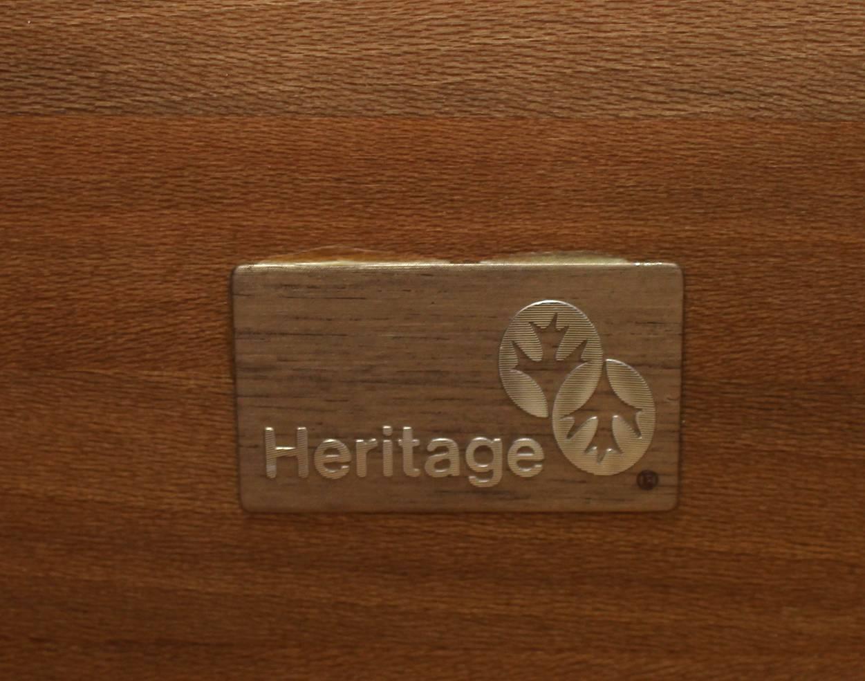 Very nice three-drawer Campaign style leather top chest with two folding brass carry handles.