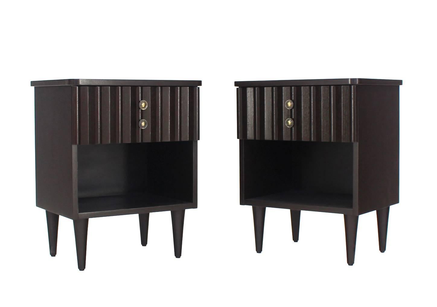 Nice pair of one drawer Mid Century Modern ebonized nightstands or end tables.