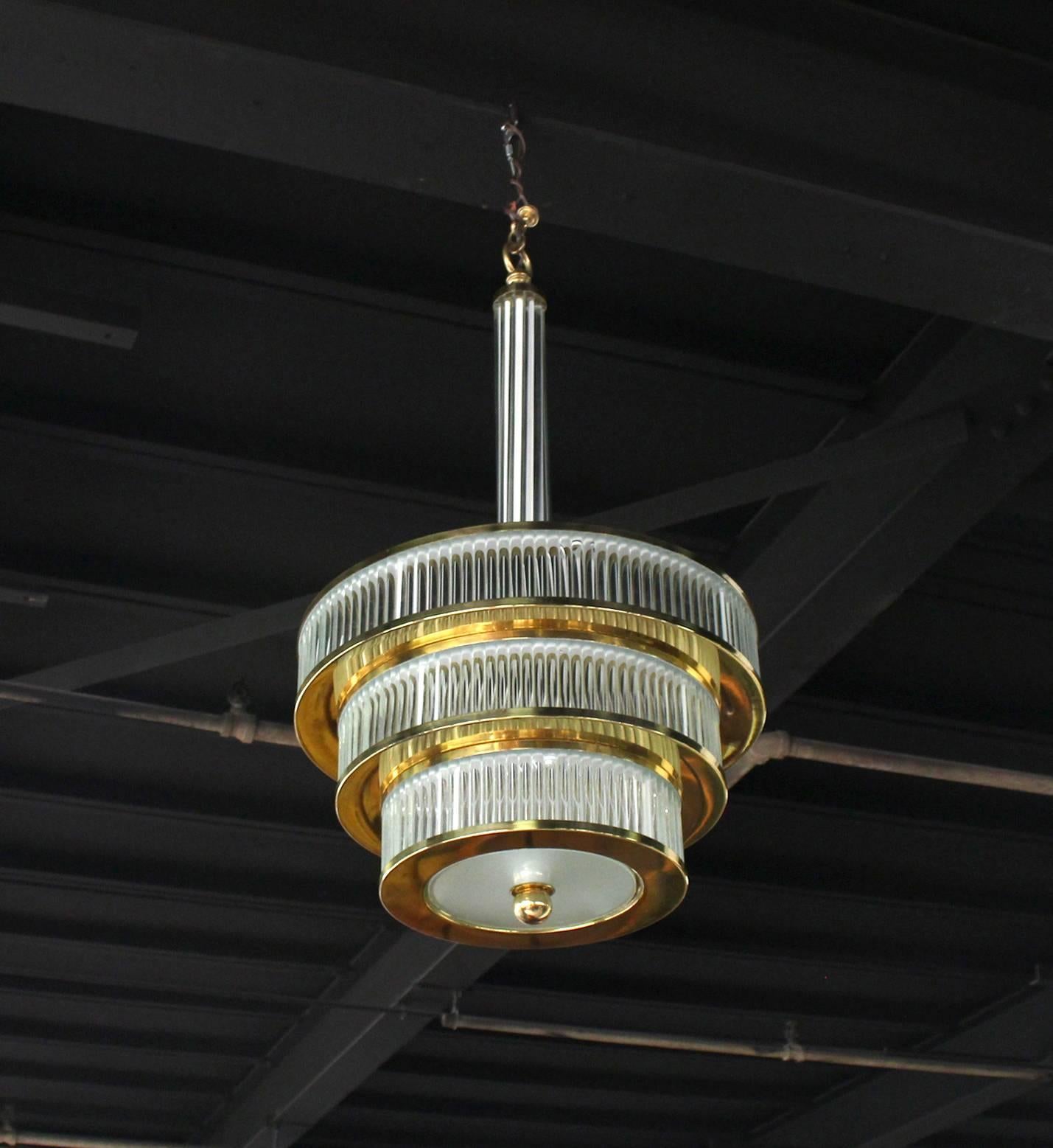 Very nice Mid-Century modern glass prisms and brass three-tier Camer or Murano style light fixture.