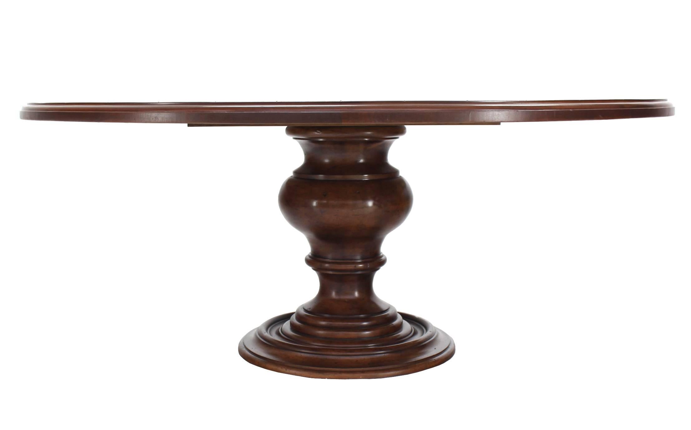 Very nice massive turned base 6' diameter round dining table.