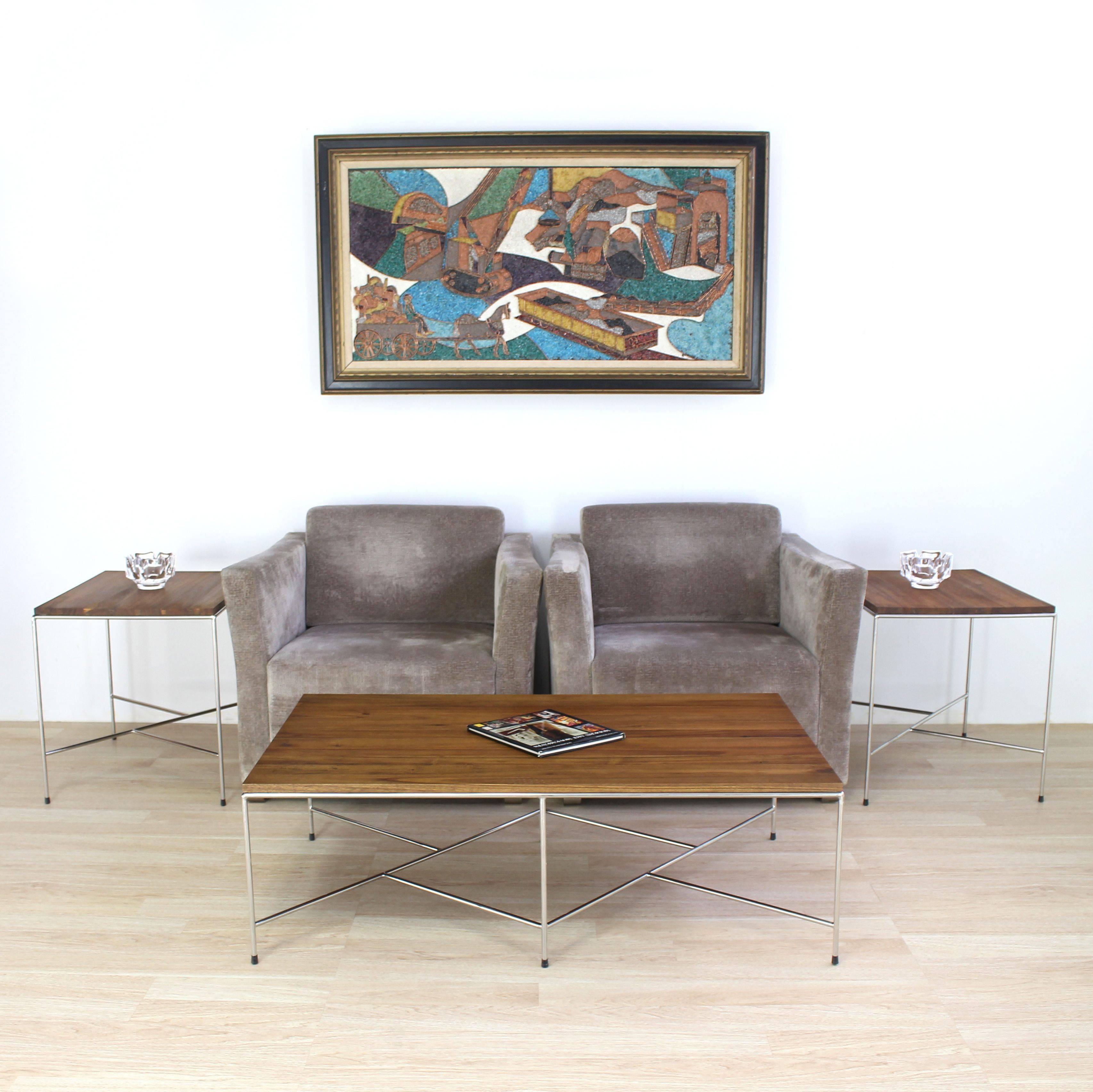Established Lines, Mid Century Modern or Bauhaus era decor coffee table. Nice rectangle shape with good medium size proportions. The base is meticulosly welded out of solid stainless steel rod and then polished to a mirror like finish. Solid 3/4″