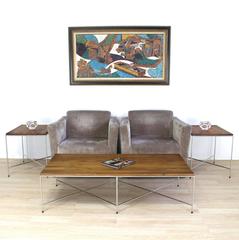 Couchtisch mit doppeltem X-Fuß und massiver Chromplatte