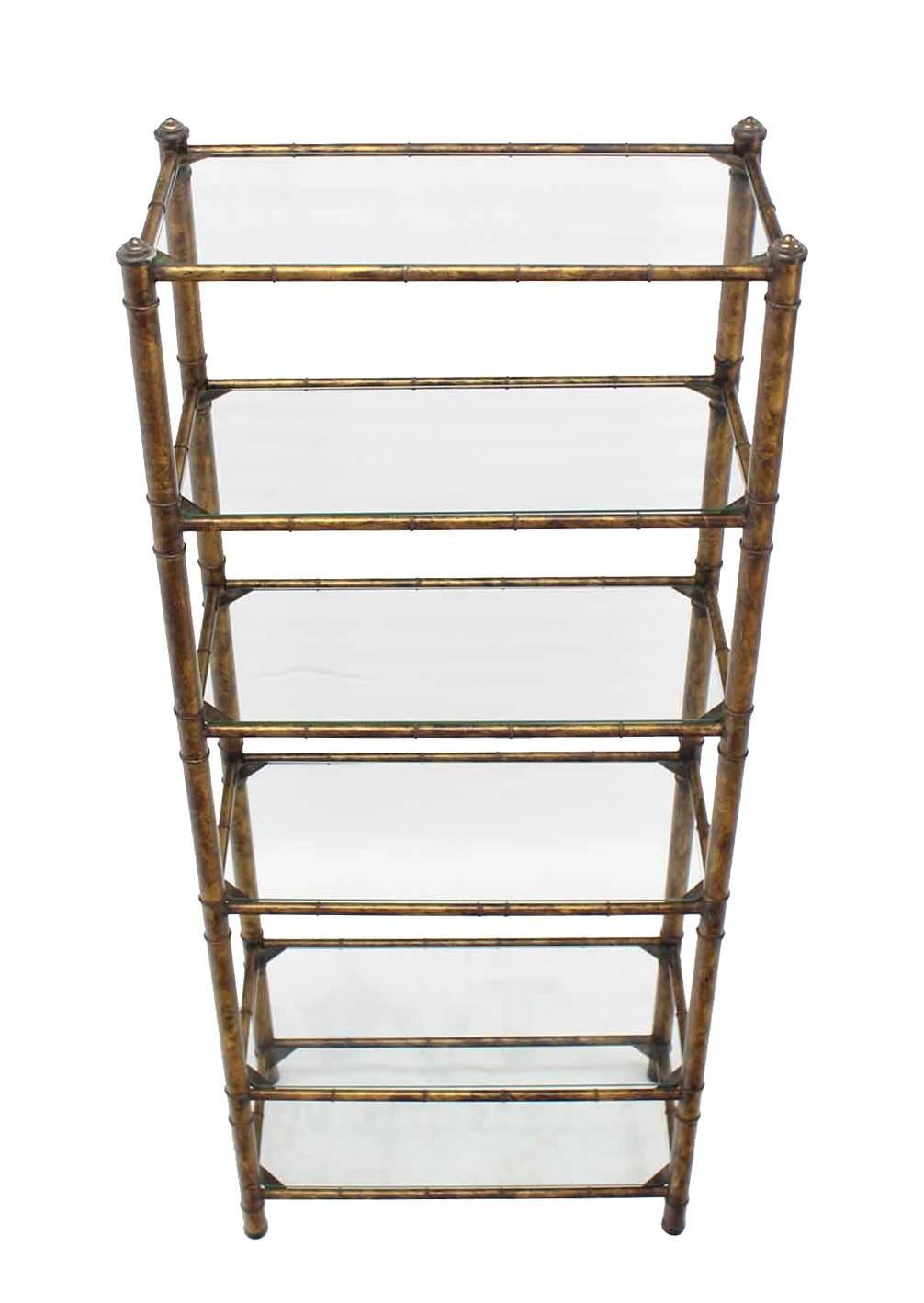 Mid-Century Modern metal shaded gold faux bamboo shelf or etagere.








In style of Maison Bagues