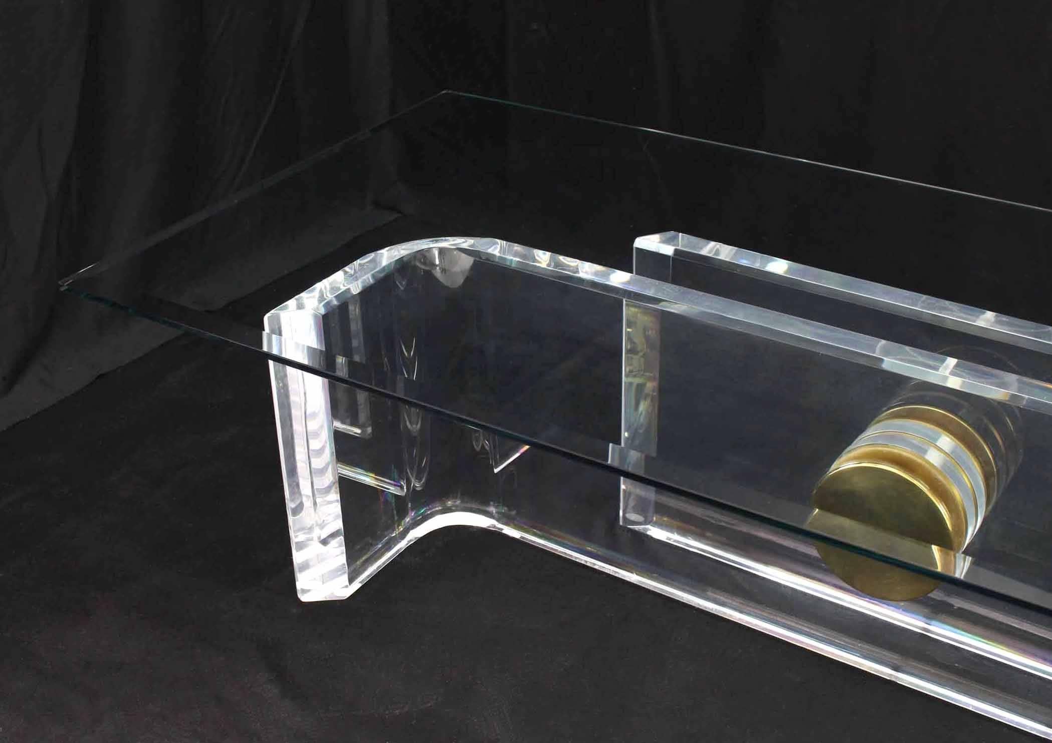 Large Rectangular Glass Top Thick Lucite and Brass Base Coffee Table In Excellent Condition In Rockaway, NJ
