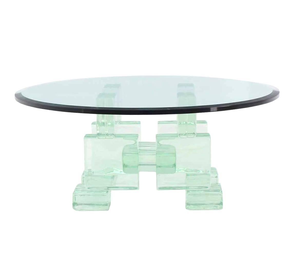 Very sculptural and unusual round Mid-Century Modern coffee table made out of glass blocks. Imperial Imagineering