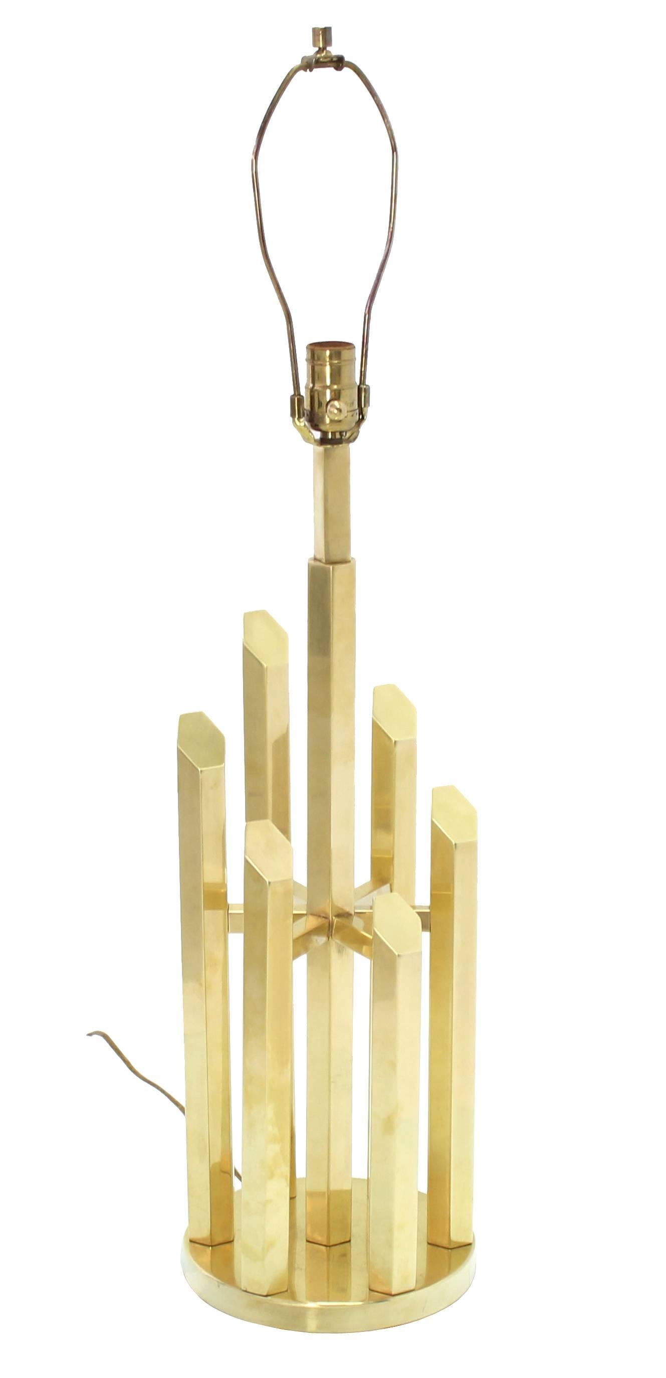 Outstanding metal work Mid-Century Modern brass table lamp is style of Mastercraft.