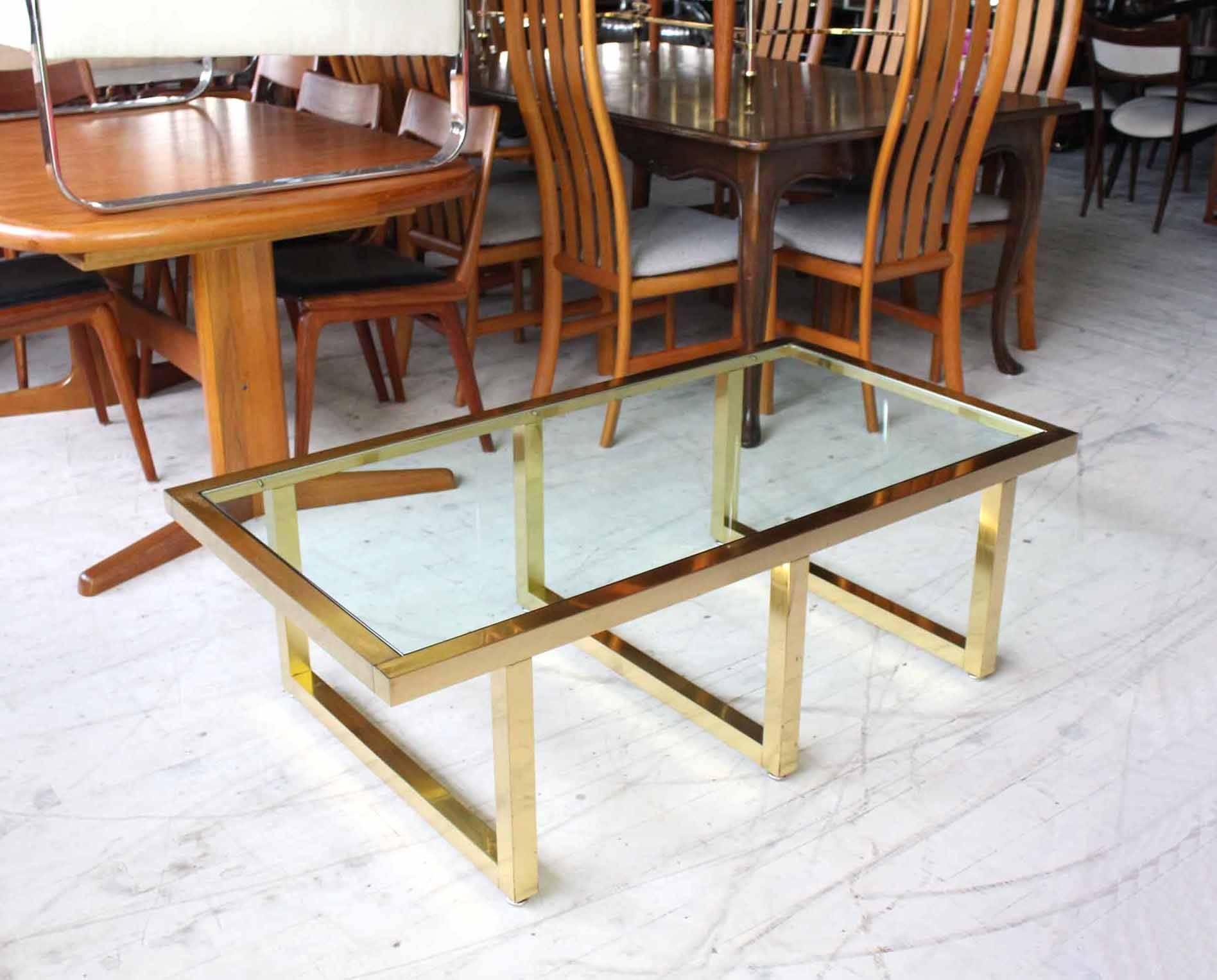 Very nice actual brass (not plated) base glass top Mid-Century Modern coffee table.